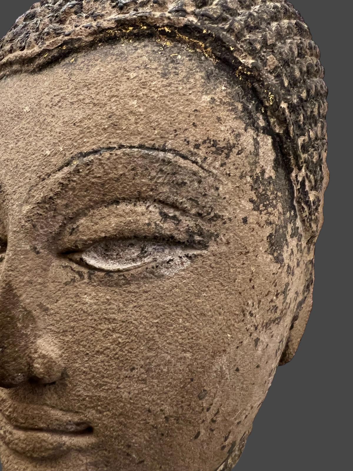 Gold Leaf Shakyamuni Buddha head in sandstone, Thailand, Ayutthaya, 17th century For Sale