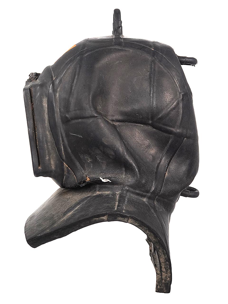 This is an early all rubber and glass shallow water diving helmet. These were used mostly in marinas for underwater ship/boat maintenance. Divers used these for cleaning barnacles and small close to the surface repairs. It displays very well.