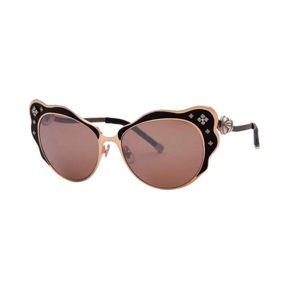Shamballa Jewells Lotus Sunglass

Bronze, black in colour, titanium frames, handmade in Japan.
Embellished at front and sides with signature Shamballa logo bead
in gold and brown leather trim. Brown gradient lenses.

Additional information:
Size: