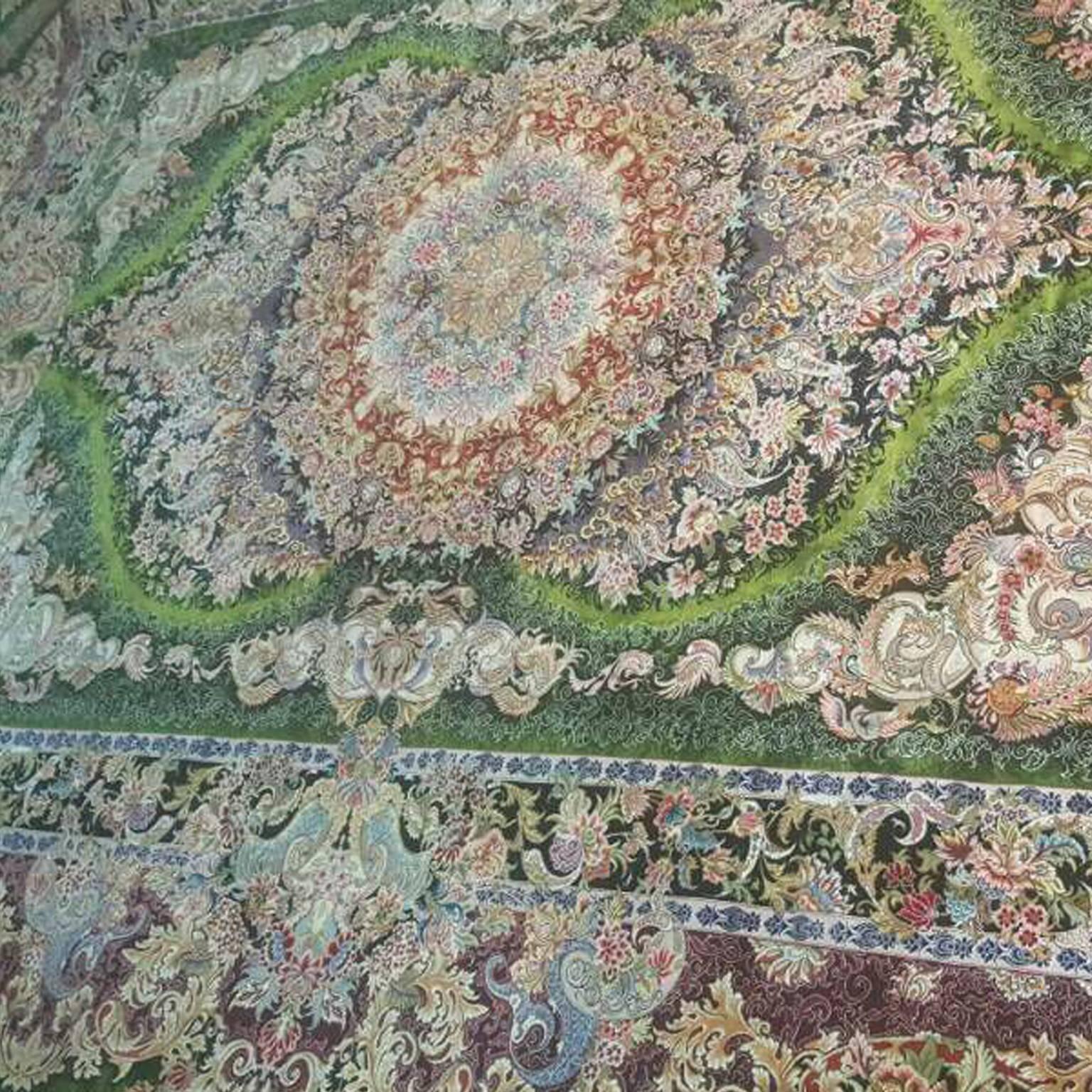 KPSI: 556
Origin: Tabriz, Iran
Composition: Silk and wool 
Size: 350cm x 250cm
Tabrizi carpets are well-known for their most diverse designs worldwide, and they are renowned for their vibrant and intricate floral presentations. 

This Tabrizi