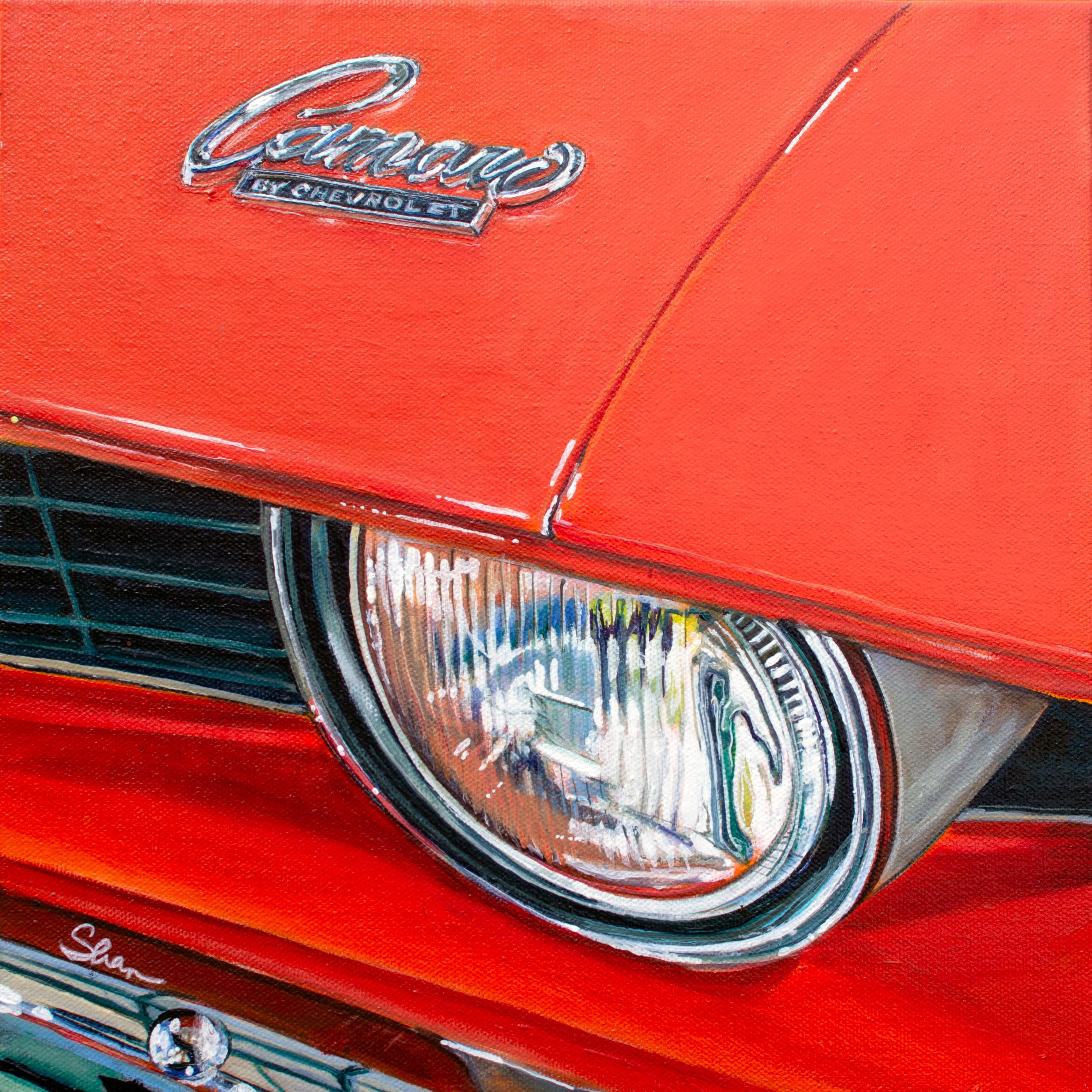 "1969 Chevrolet Camaro SS - Hugger Orange" de Shan Fannin es una pintura acrílica original que representa un primer plano de la parrilla y el faro delantero de un Camaro naranja clásico. 

Nacida en 1969 en California, la artista Shannon "Shan"