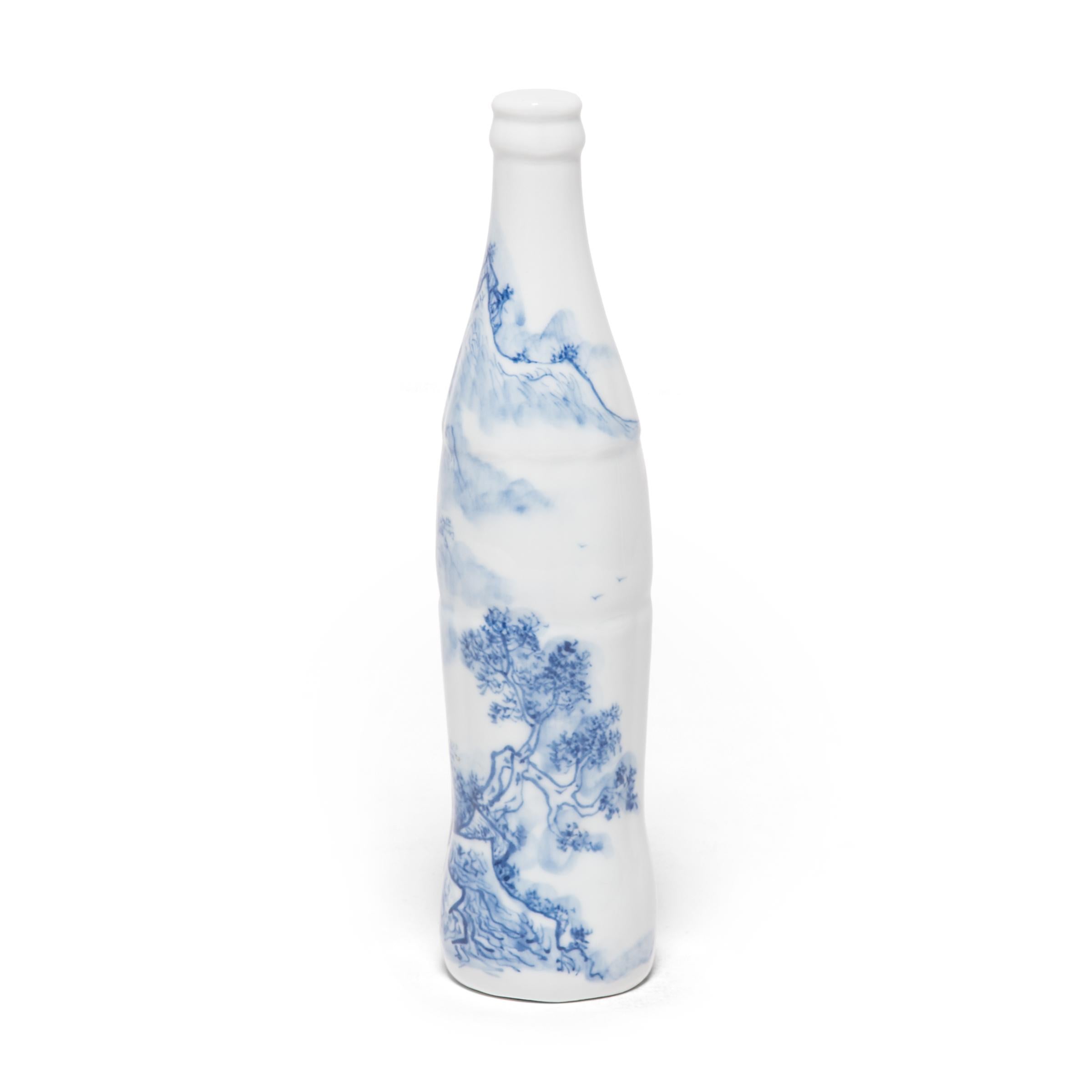 Created by artist Taikkun Li exclusively for Pagoda Red, this limited edition hand painted cola bottle is one of a series drawing on the rich tradition of Chinese blue and white ceramics. Fired at the historic Chinese imperial kilns of Jingdezhen,