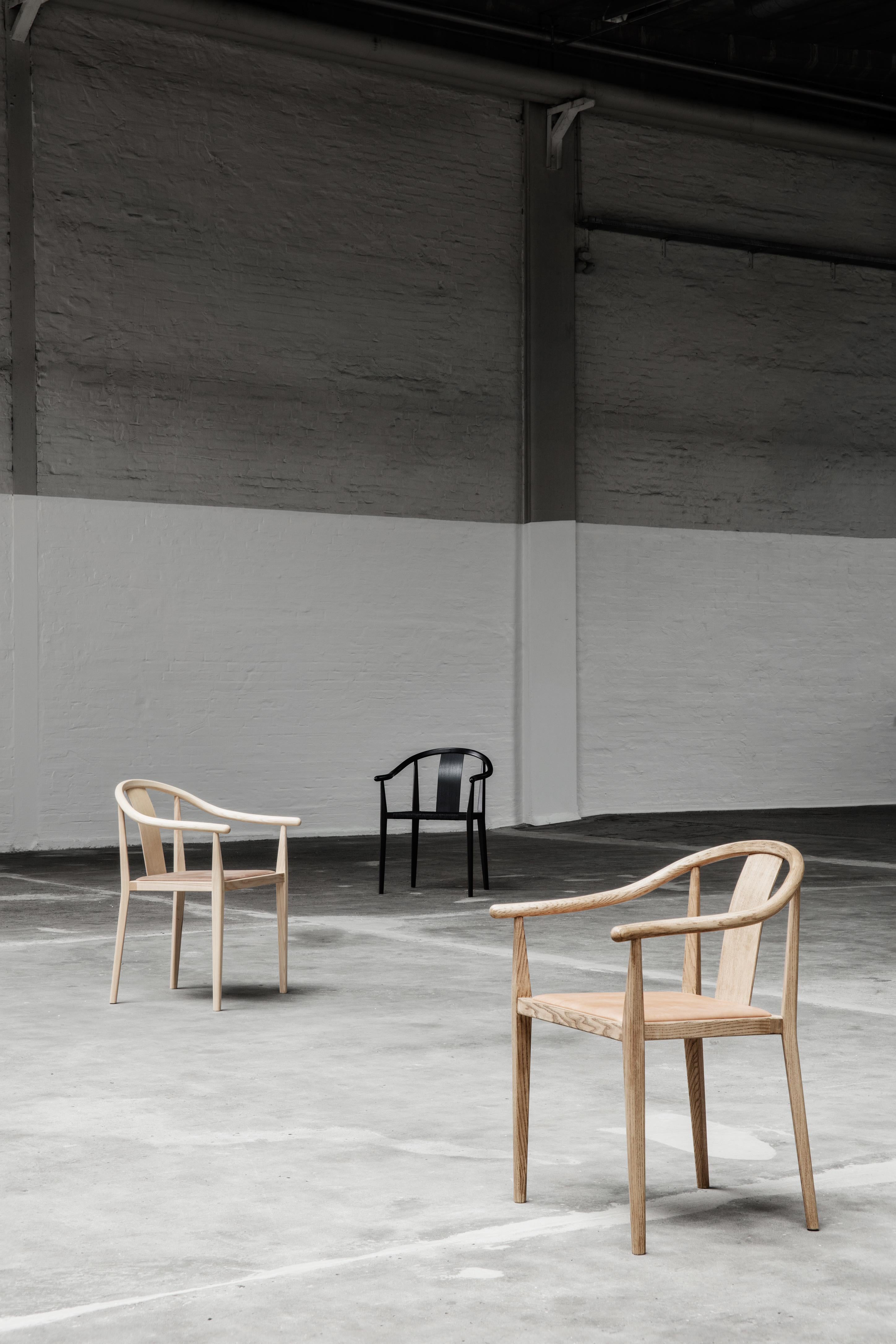 „Shanghai“-Stuhl von Norr11, helles geräuchertes Eichenholz, natürliches Rattan (Dänisch) im Angebot