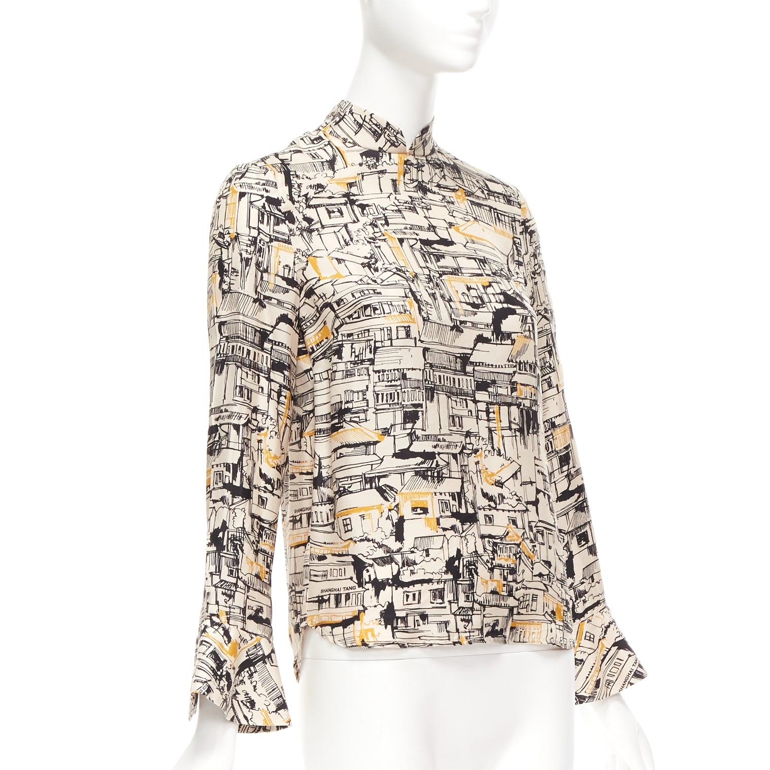 SHANGHAI TANG 100% silk beige village house print chinese collar blouse FR36 S
Reference: CELG/A00390
Brand: Vivienne Tam
Material: Silk
Color: Beige, Multicolour
Pattern: Abstract
Closure: Zip
Extra Details: Back zip with ST logo zipper head.
Made