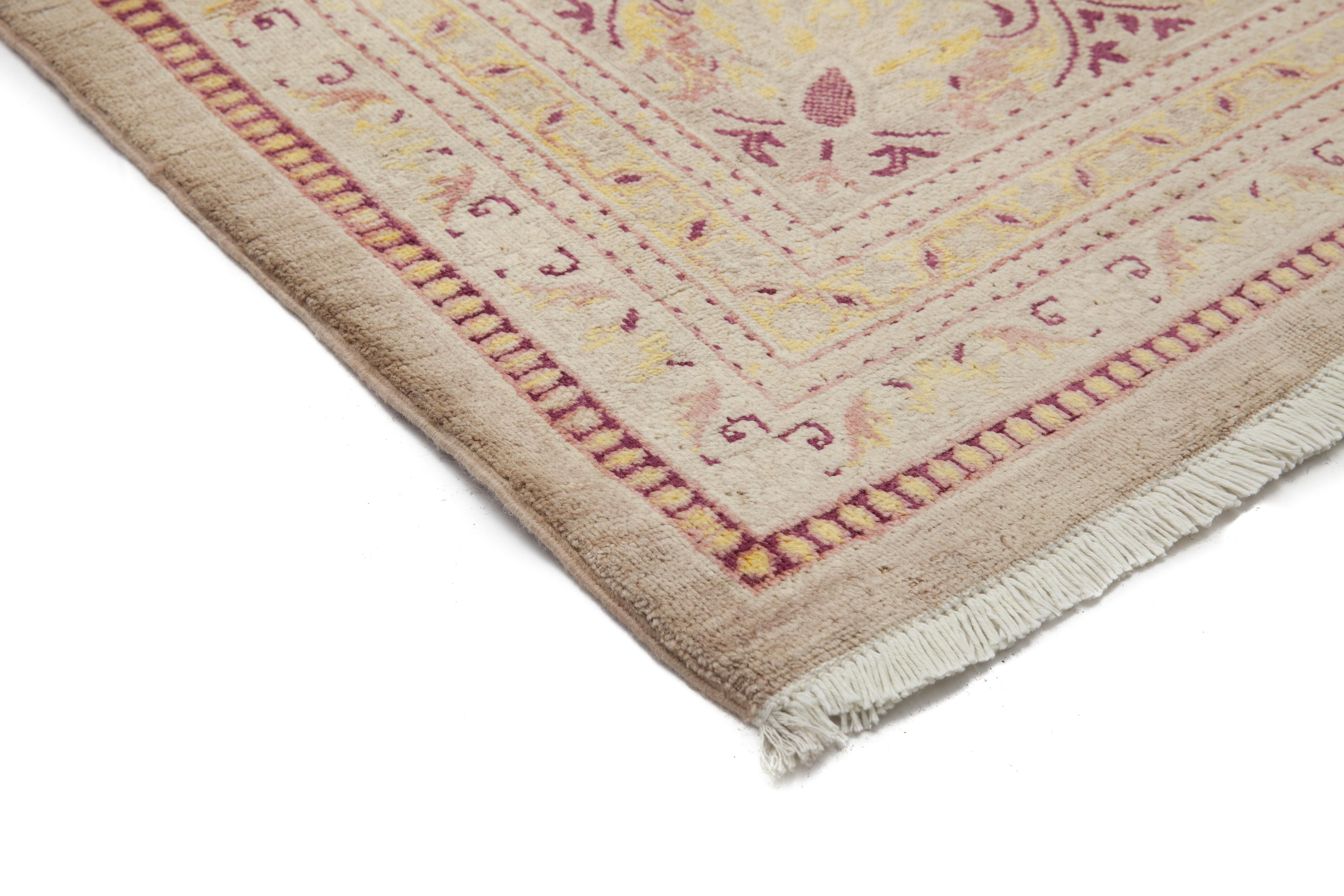 Color: Ivory - Made In: Pakistan. 100% Wool. Originating centuries ago in what is now Turkey, Oushak rugs have long been sought after for their intricate patterns, lush yet subtle colors, and soft luster. These rugs continue that tradition.