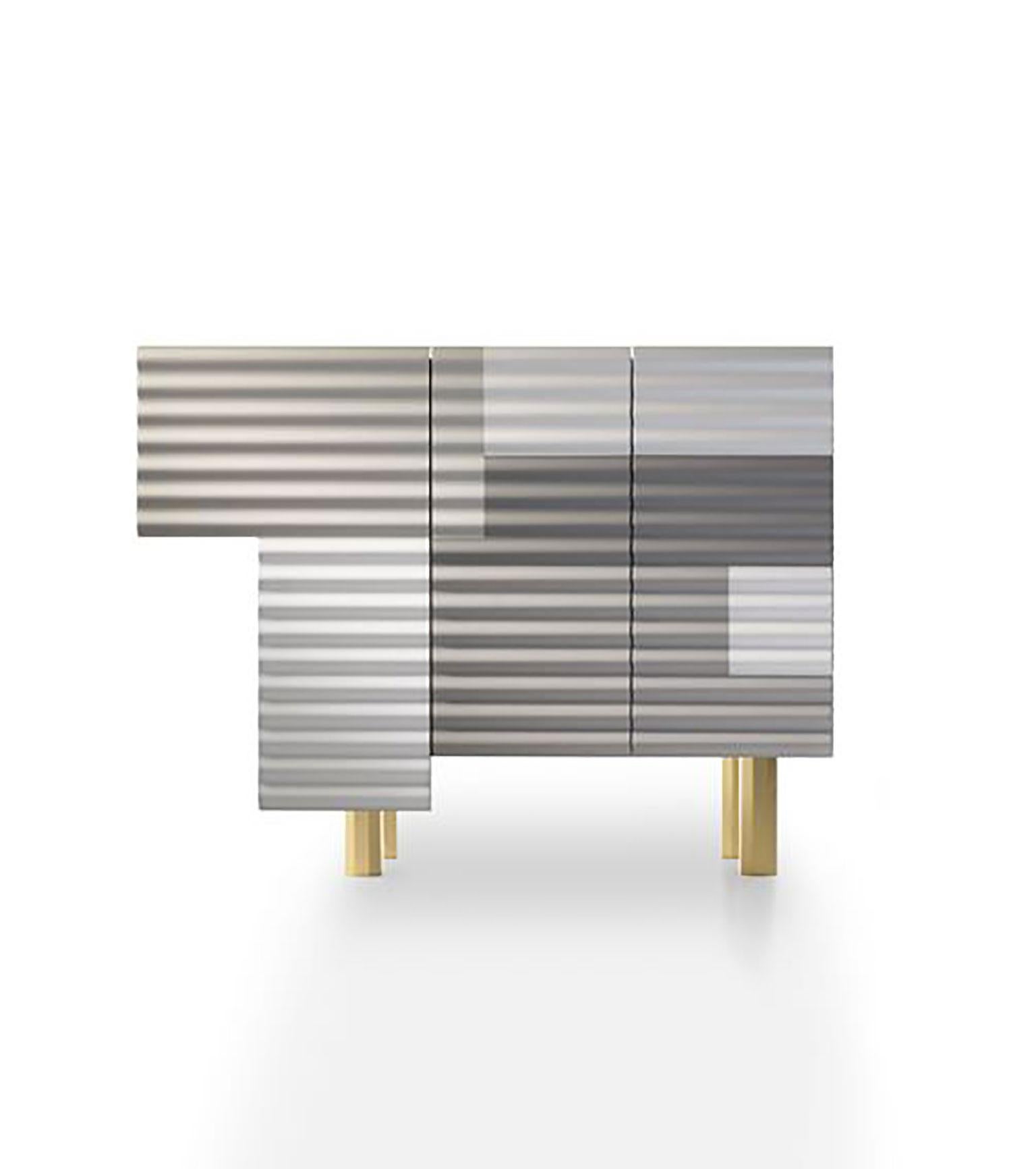 Shanty cabinet designed by Doshi Levien for BD Barcelona. This unique piece is styled after the ridged steel sheets which are utilized to develop numerous brief or temporary homes around the world. This unconstrained arrangement of superimposed