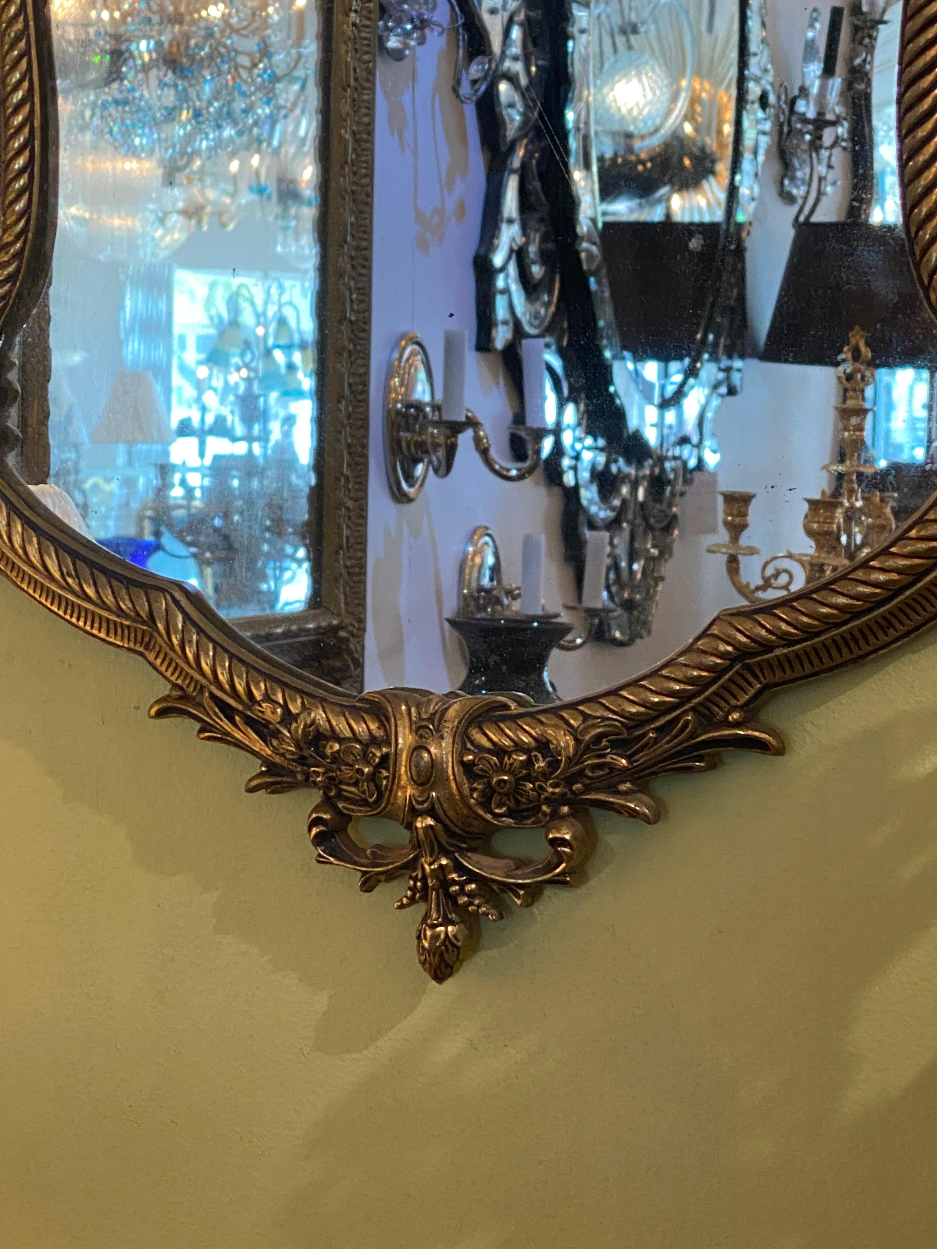 20th Century Shaped Louis XV Style Polished Bronze Mirror For Sale