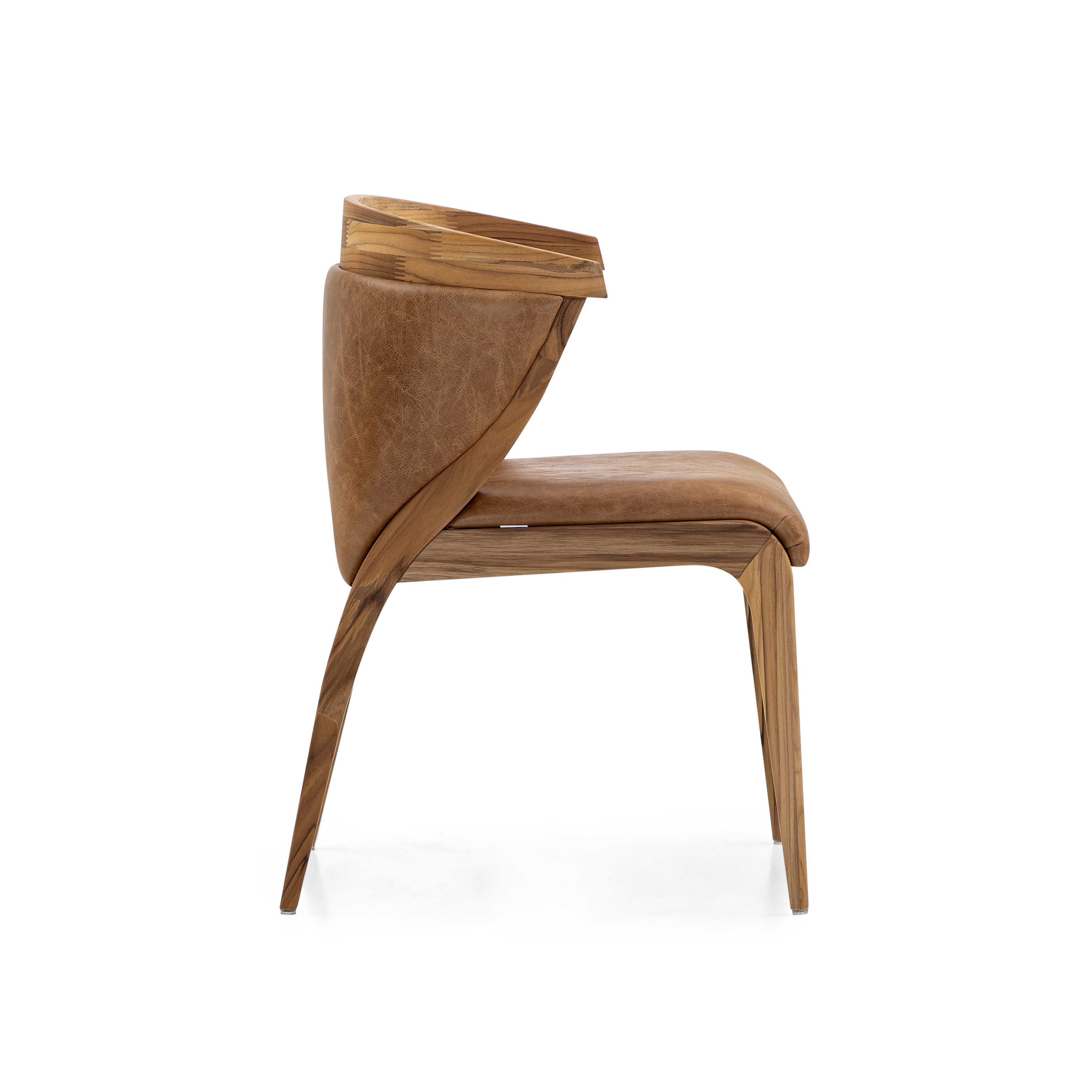 Our Uultis team has created the beautifully shaped Mat dining chair to decorate your beautiful dining table with an upholstered back and seat in brown leather and a teak wood finish. This chair has a beautiful simple but elegant design that it will