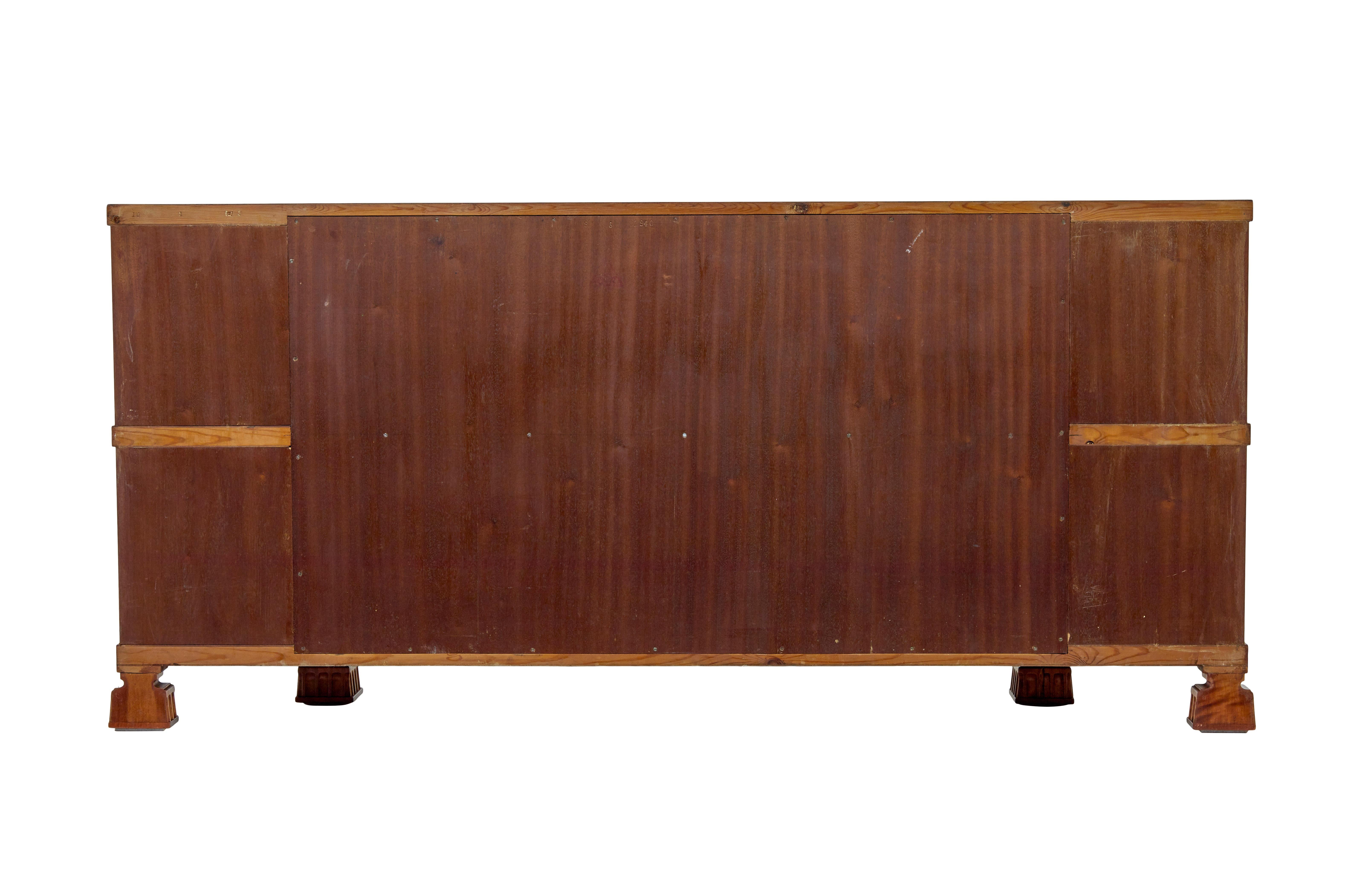Swedish Shaped mid century Scandinavian mahogany low open bookcase