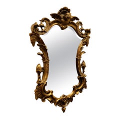 Miroir mural doré de style rococo
