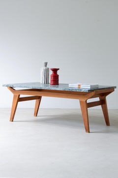 Shaped wooden living room table with green Alps marble top