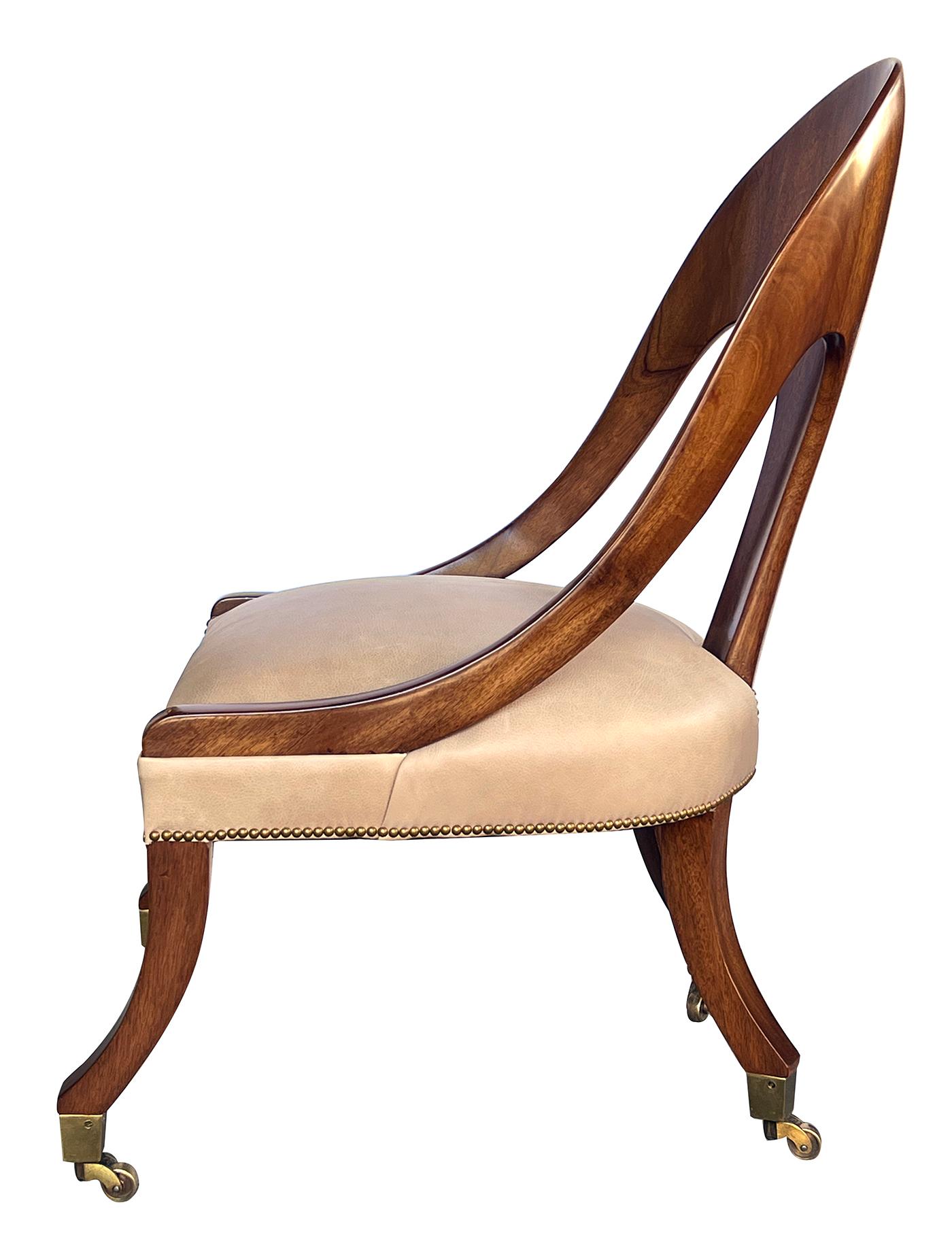 Leather Shapely English Regency Style Solid Mahogany Spoonback Chair For Sale