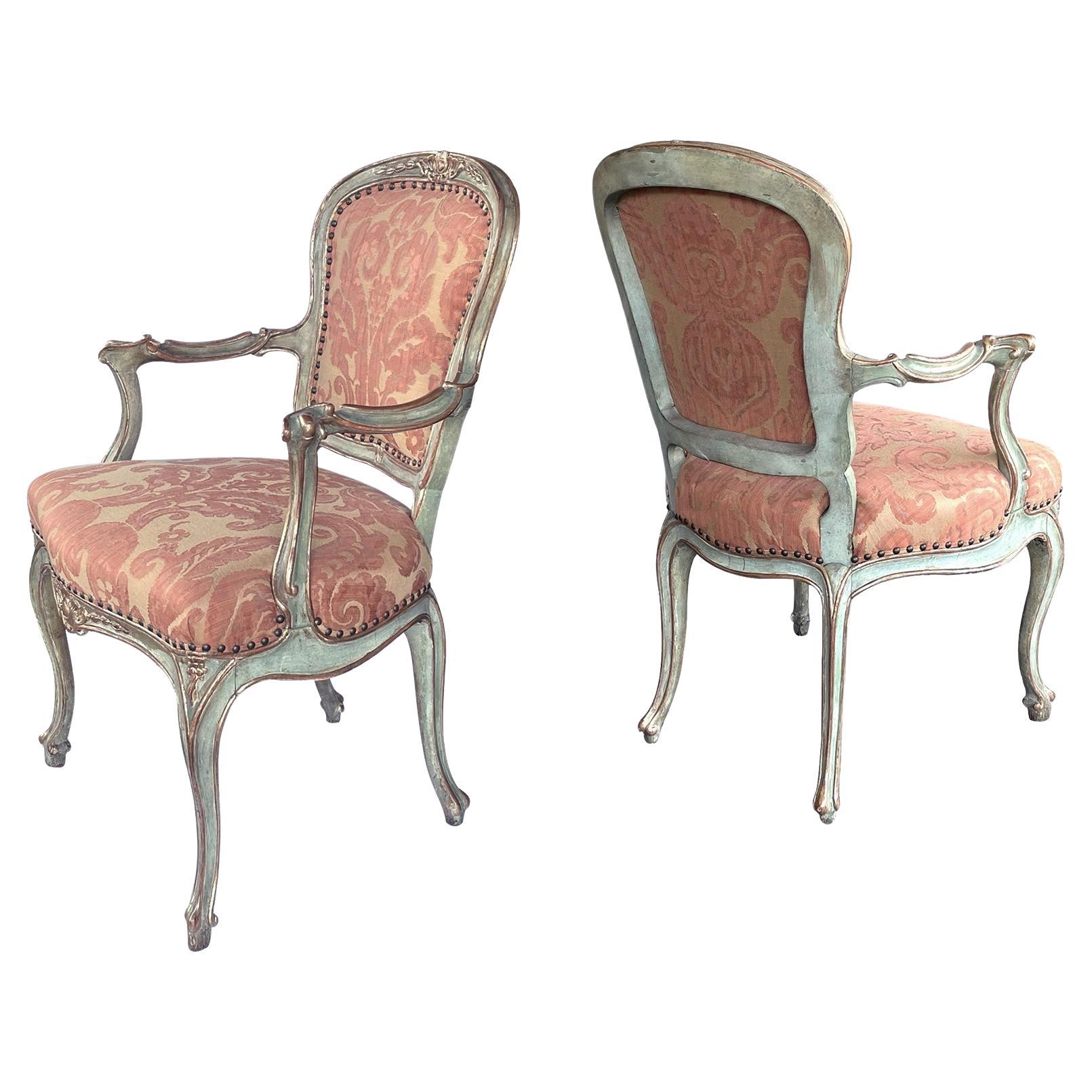 Shapely Pair of Italian Rococo Style Aqua Painted and Parcel-Gilt Armchairs For Sale