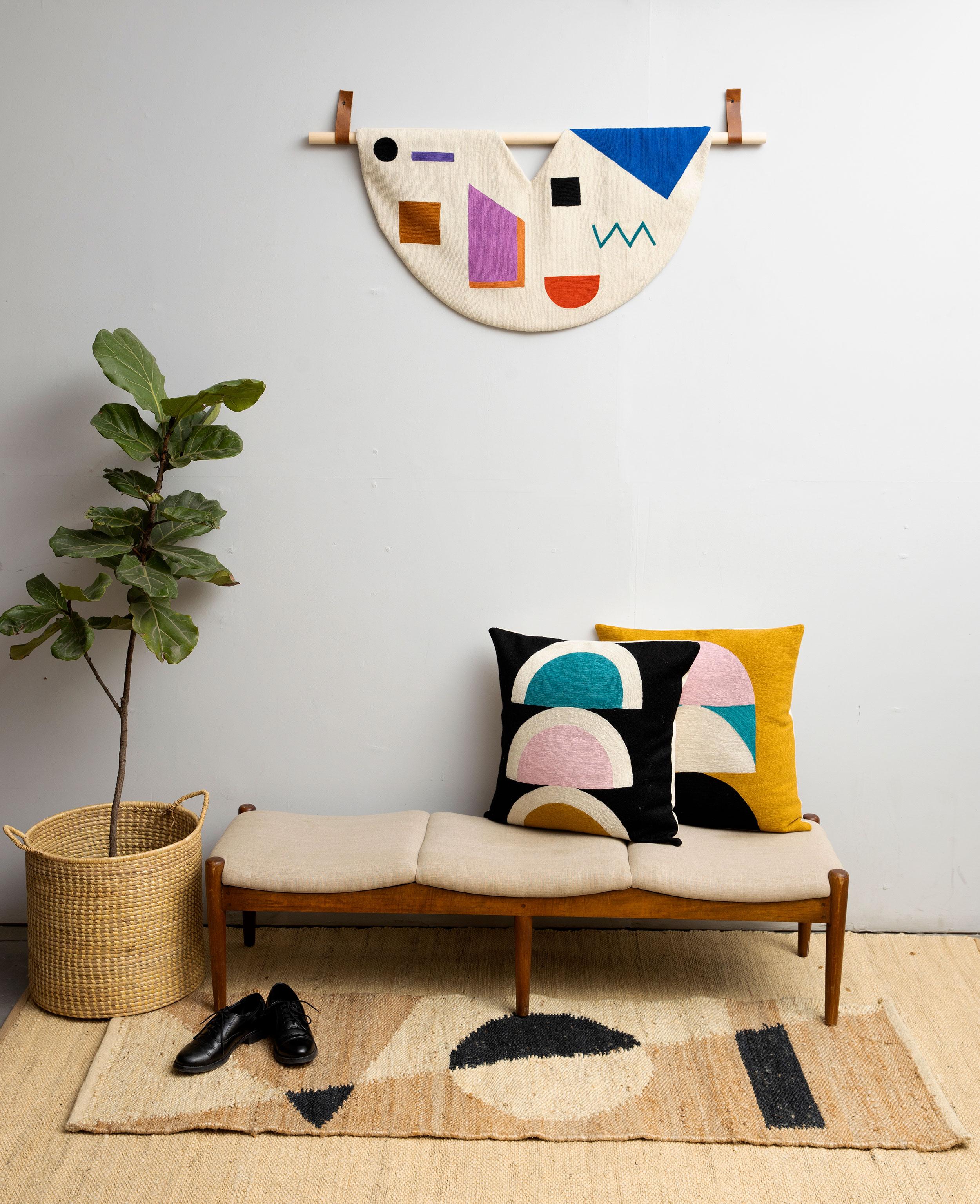 This modern, geometric tapestry has been ethically hand embroidered by artisans in Kashmir, India, using a traditional embroidery technique which is native to this region.

The purchase of this handcrafted tapestry helps to support the artisans