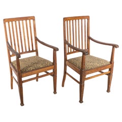 Shapland & Petter. Un par de sillones Arts and Crafts de roble