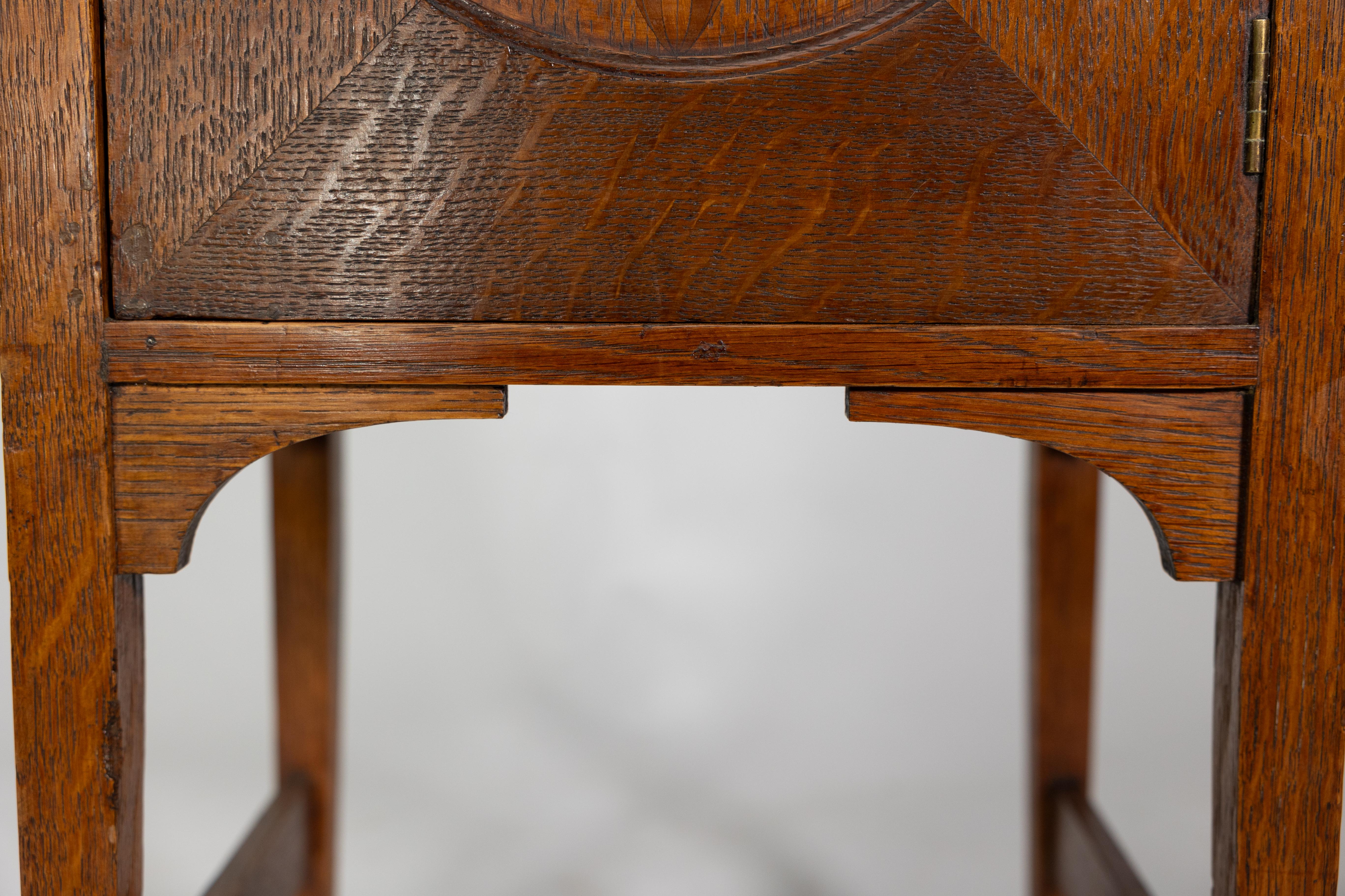 Shapland and Petter. An Arts and Crafts oak bedside cabinet For Sale 7