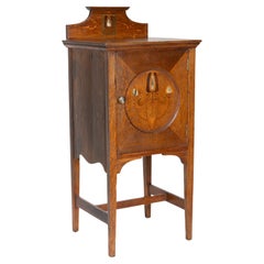 Antique Shapland and Petter. An Arts and Crafts oak bedside cabinet
