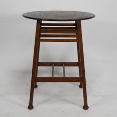 Shapland and Petter. An oak Arts & Crafts side table with a hammered copper top.