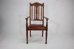 Shapland and Petter. Three Arts and Crafts oak dining armchairs