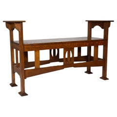 Shapland & Petter, Un bon tabouret de piano double en chêne Arts & Crafts ou un siège de fenêtre.