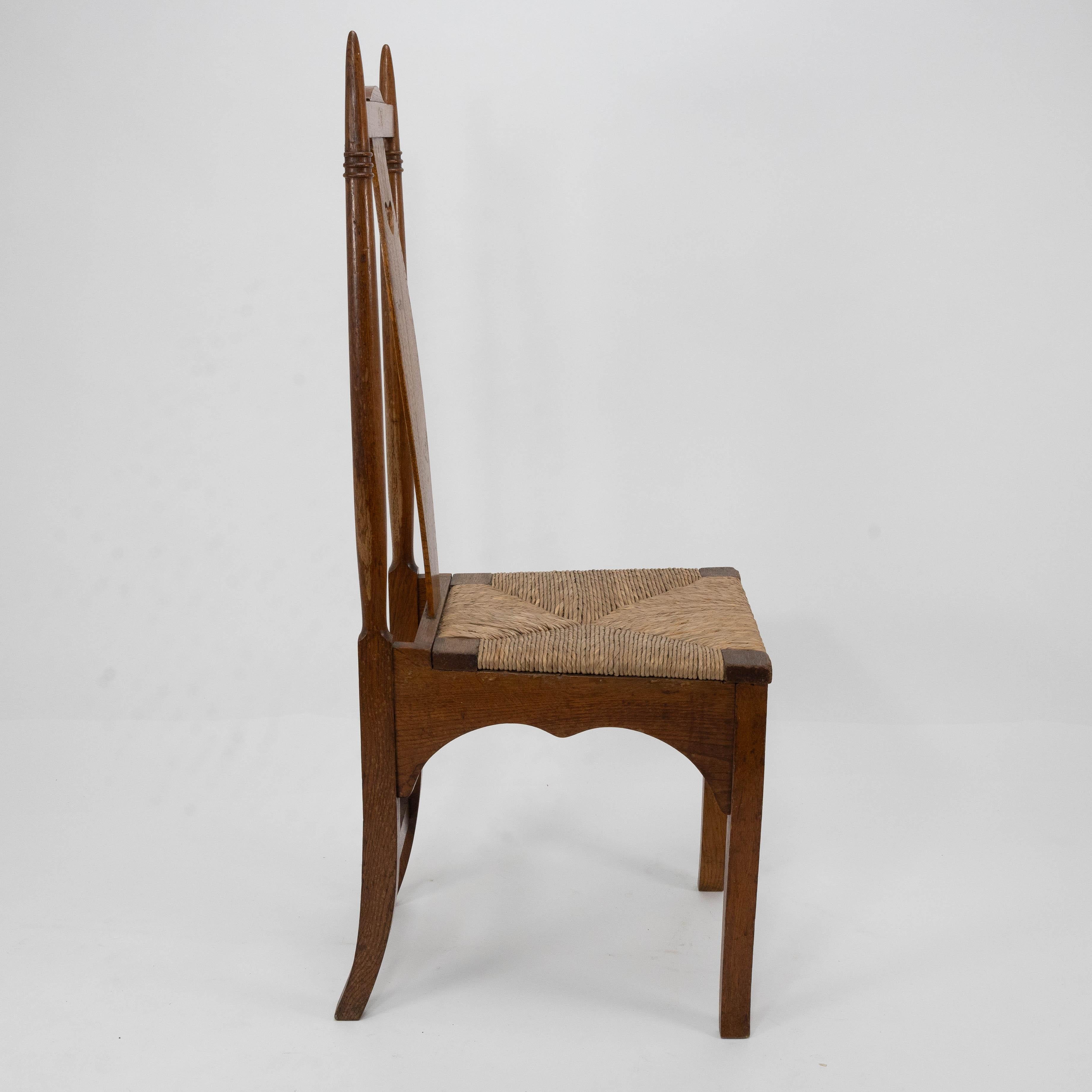 English Shapland & Petter a Pair of Arts & Crafts Oak Dining Chairs with Pierced Hearts For Sale