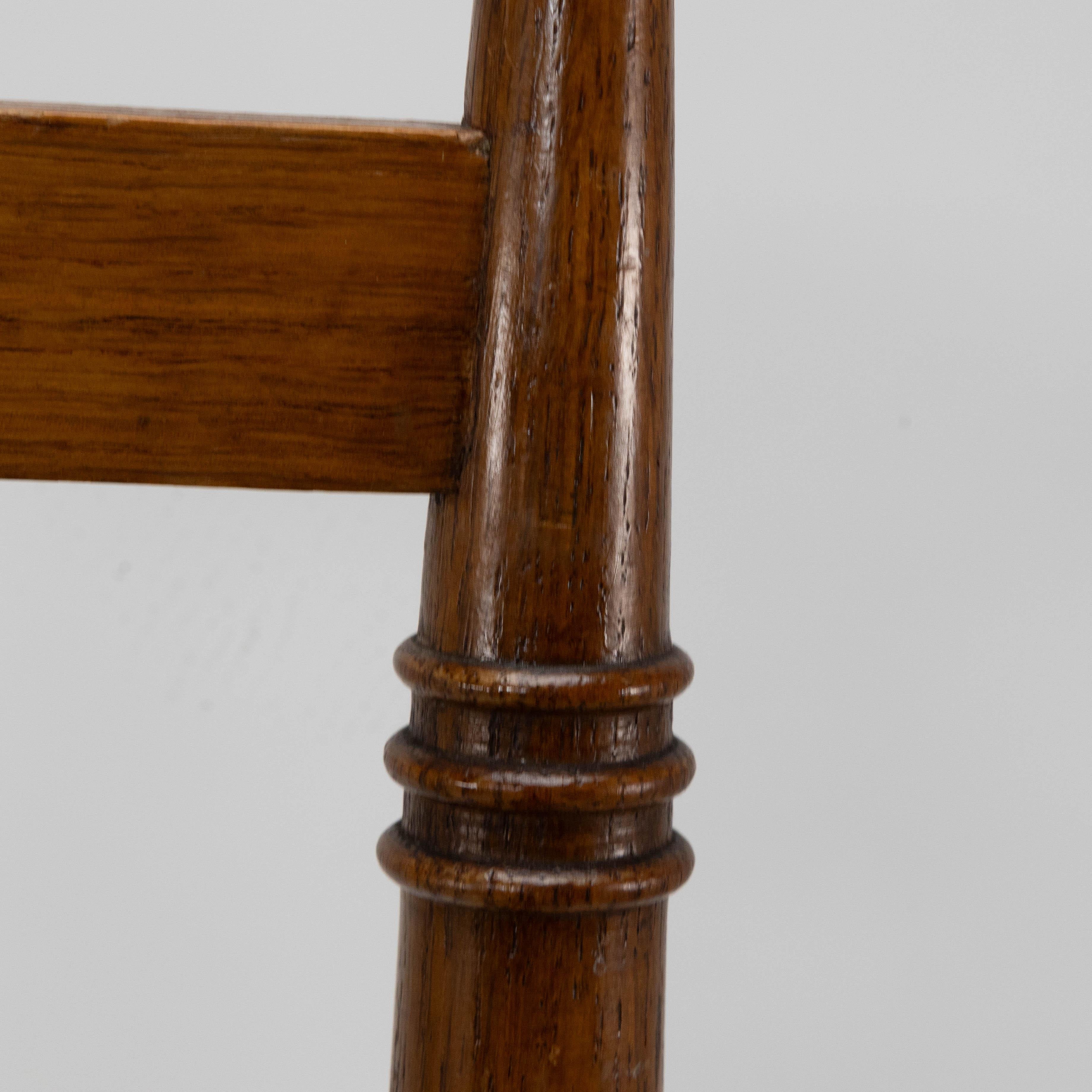 Shapland & Petter a Pair of Arts & Crafts Oak Dining Chairs with Pierced Hearts For Sale 1