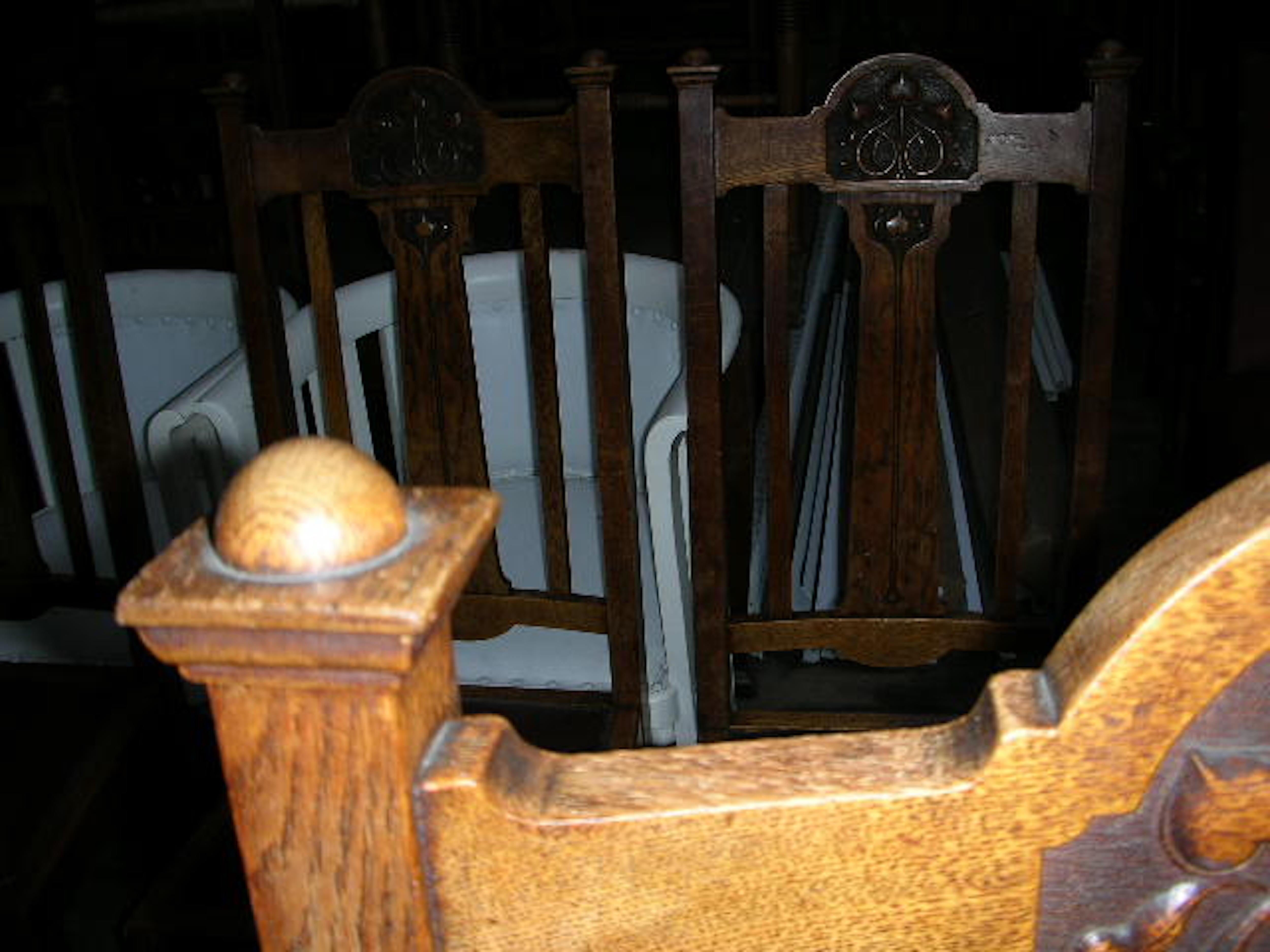 Arts and Crafts Shapland & Petter, a Set of Six Arts & Crafts Oak Dining Chairs with Two Carvers