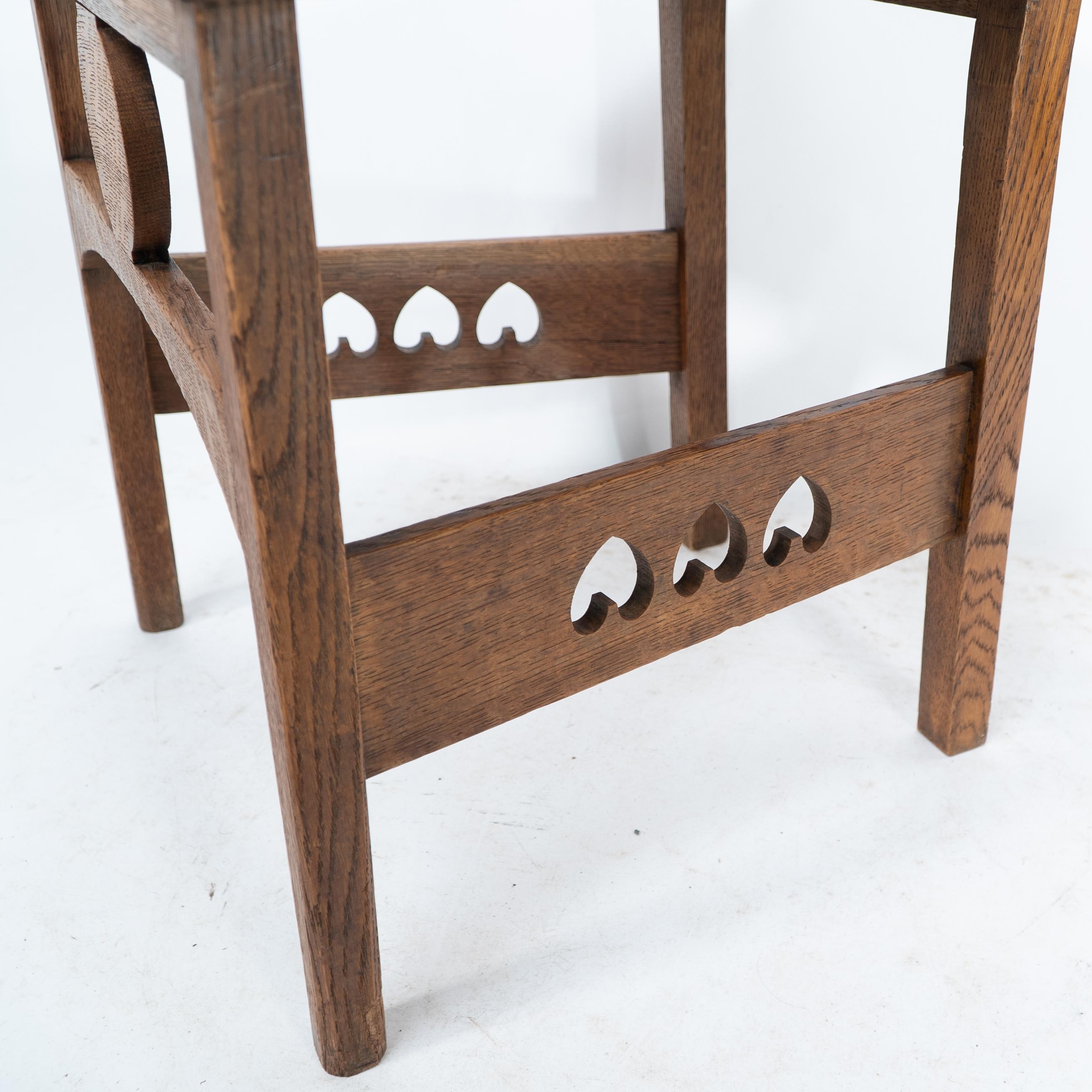 Shapland & Petter. An Arts & Crafts oak desk or side chair with pierced hearts For Sale 4