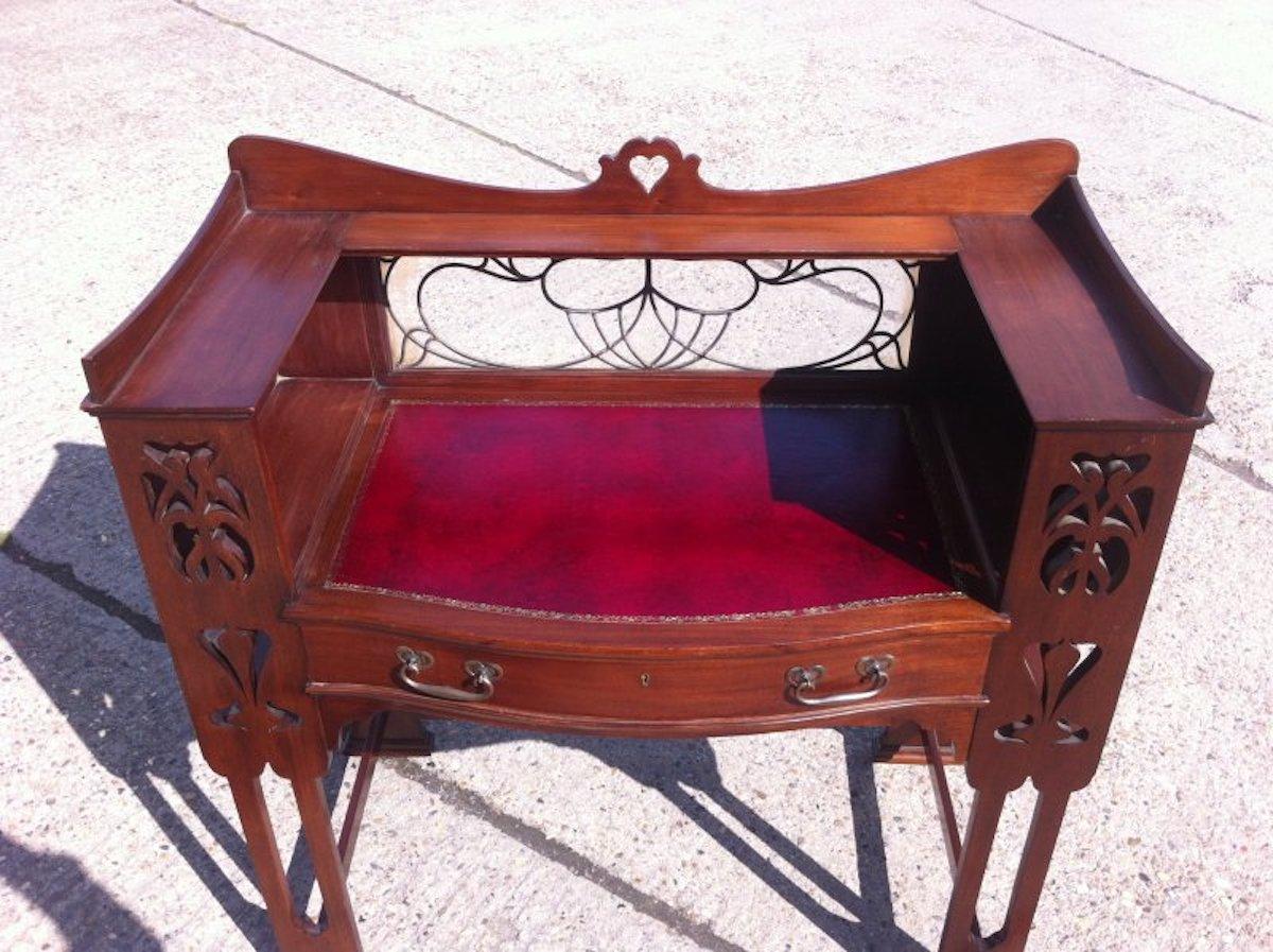 English Shapland & Petter, Arts & Crafts Mahogany Desk with a Pierced Heart to the Top For Sale