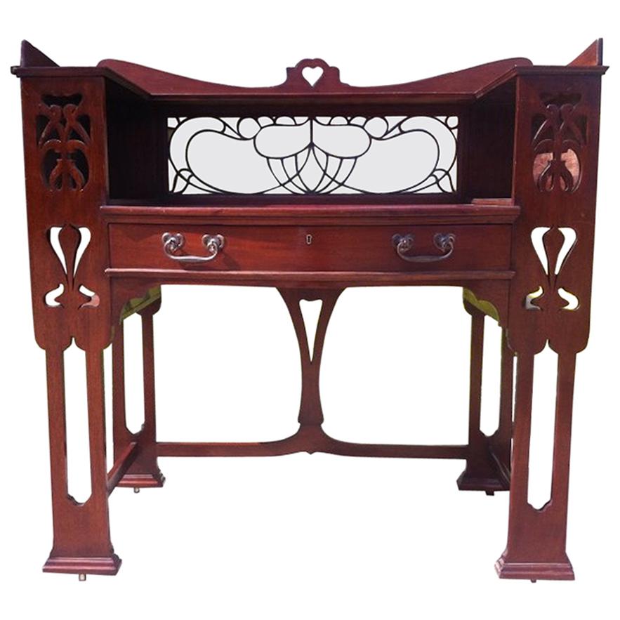 Shapland & Petter, Arts & Crafts Mahogany Desk with a Pierced Heart to the Top For Sale
