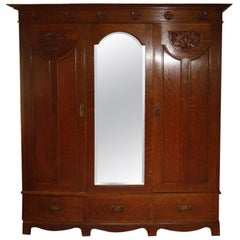 Shapland & Petter, Arts & Crafts Oak Treble Wardrobe with Floral Carved Details