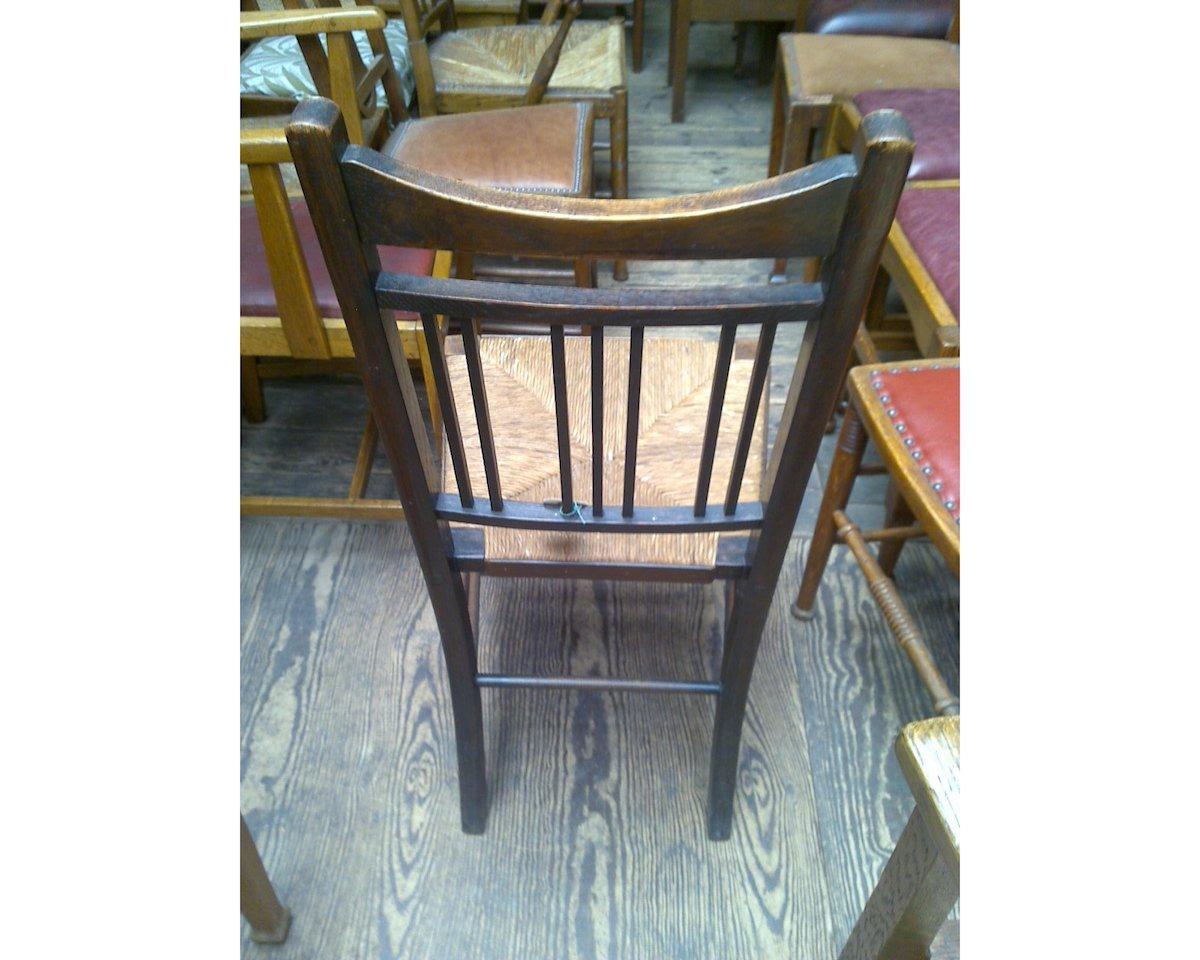 English Shapland & Petter Attr, a Set of Four Simple Arts & Crafts Rush Seated Chairs For Sale