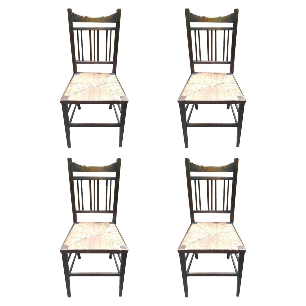 Shapland & Petter Attr, a Set of Four Simple Arts & Crafts Rush Seated Chairs