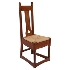 Shapland & Petter, Baillie Scott Style of, Arts & Crafts oak rush seated chair