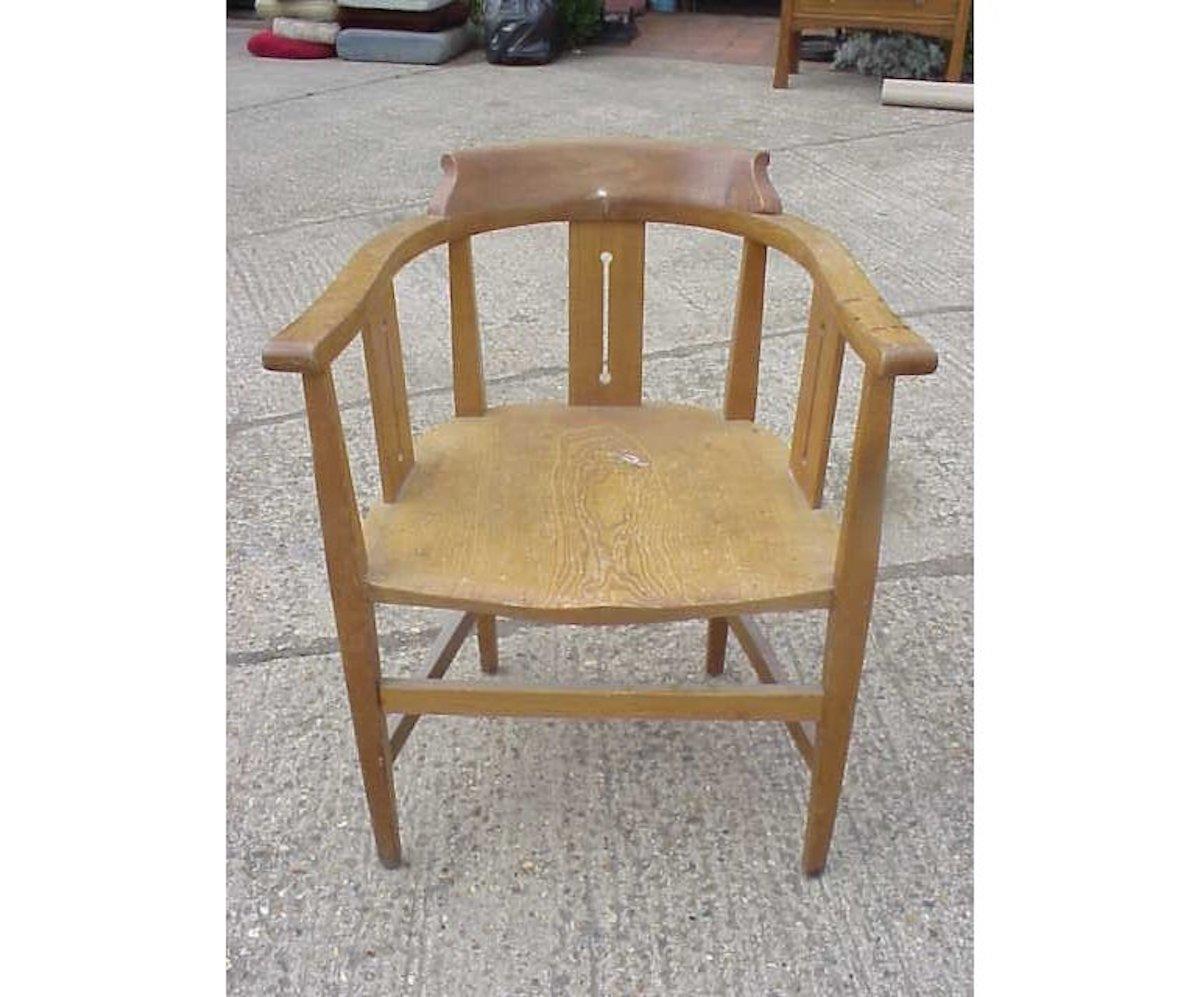 Shapland and Petter. A good set of seven Arts & Crafts oak armchair's with shaped headrests, stylized cutouts to the side and back splats, and contoured comfortable seats with a good stretcher arrangement making them very strong and sturdy.
For sale