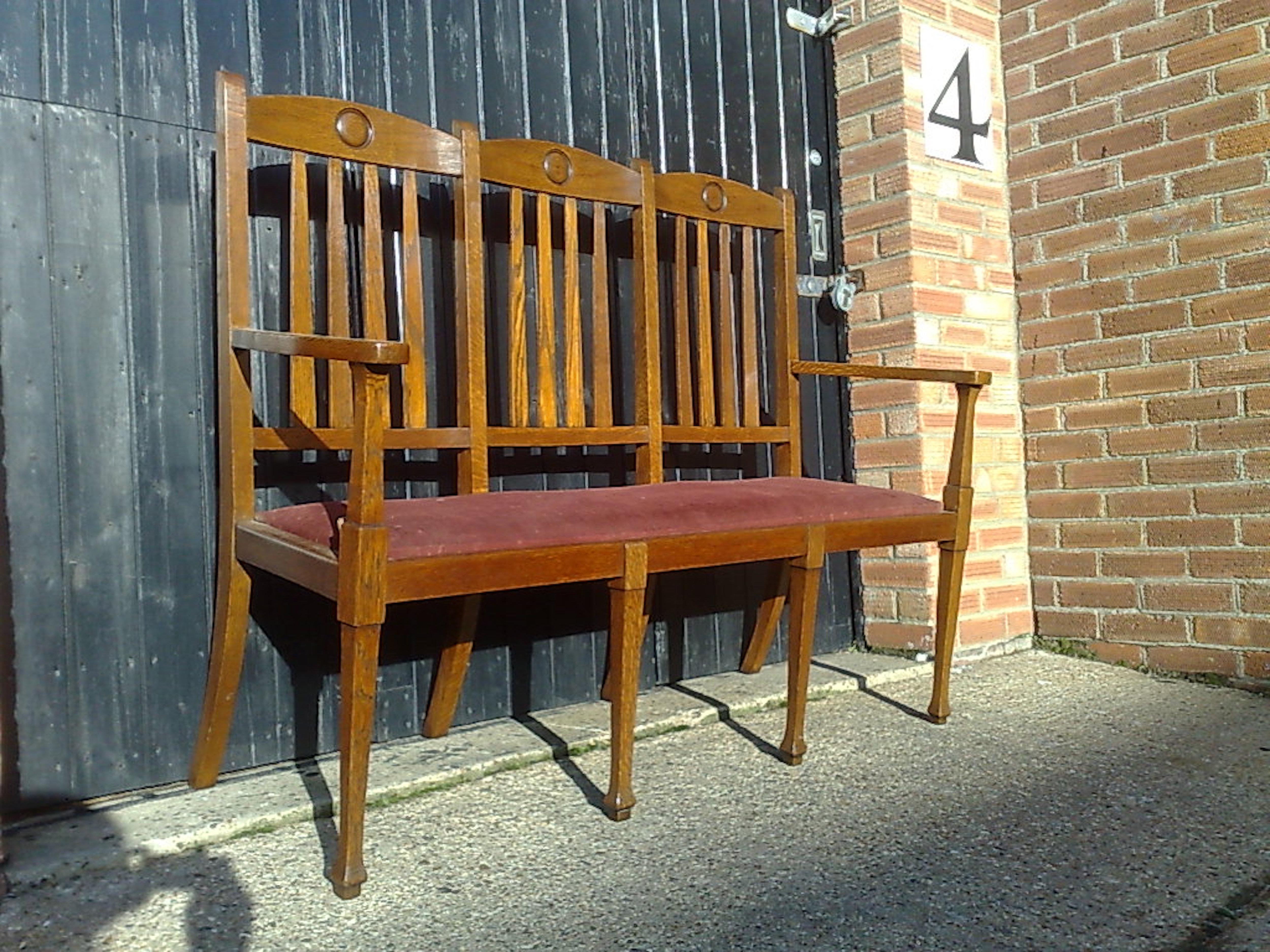 Hand-Carved Shapland & Petter, Set Ten Arts & Crafts Oak Dining Chairs with Matching Settee For Sale