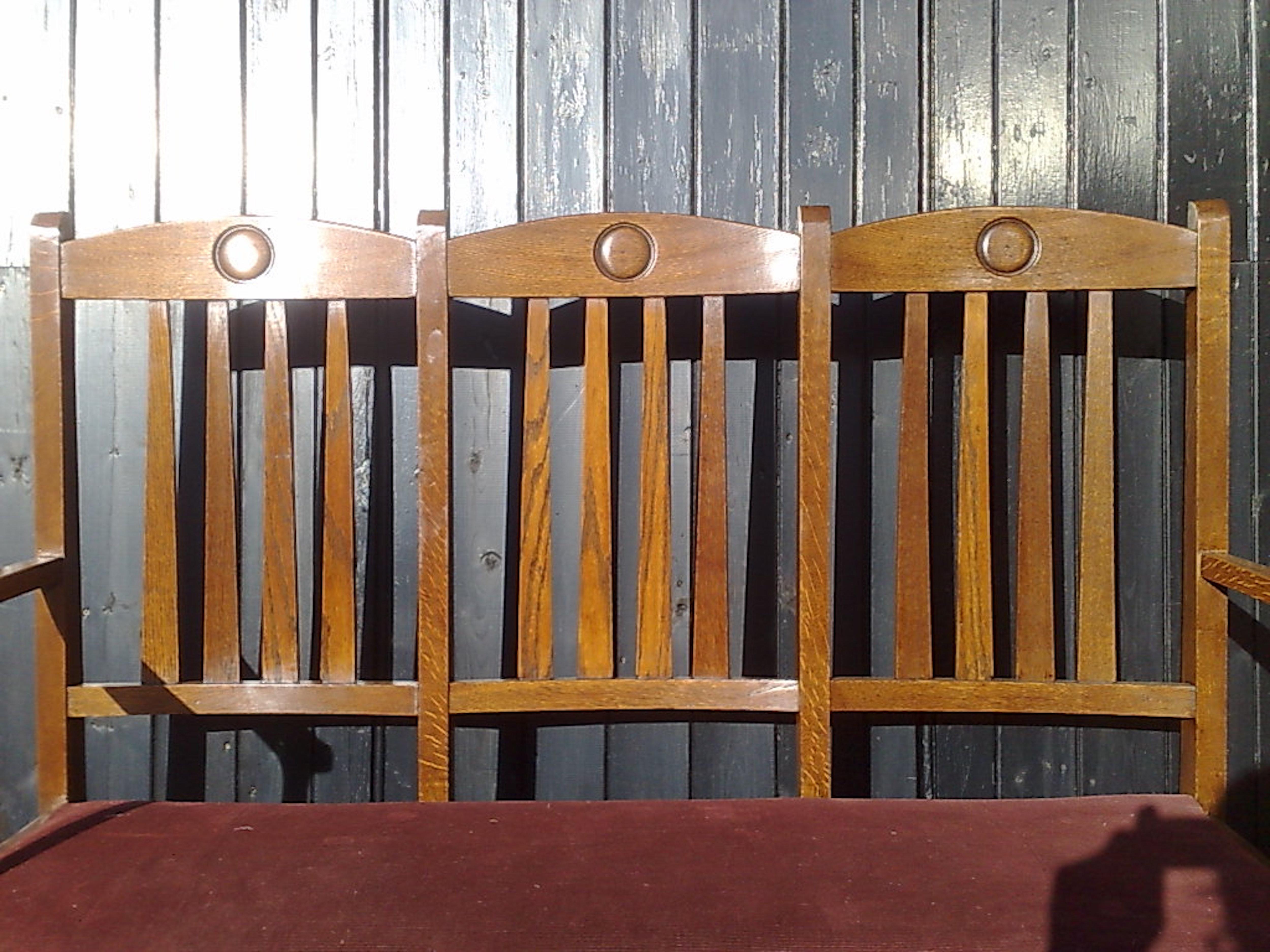 Early 20th Century Shapland & Petter, Set Ten Arts & Crafts Oak Dining Chairs with Matching Settee For Sale