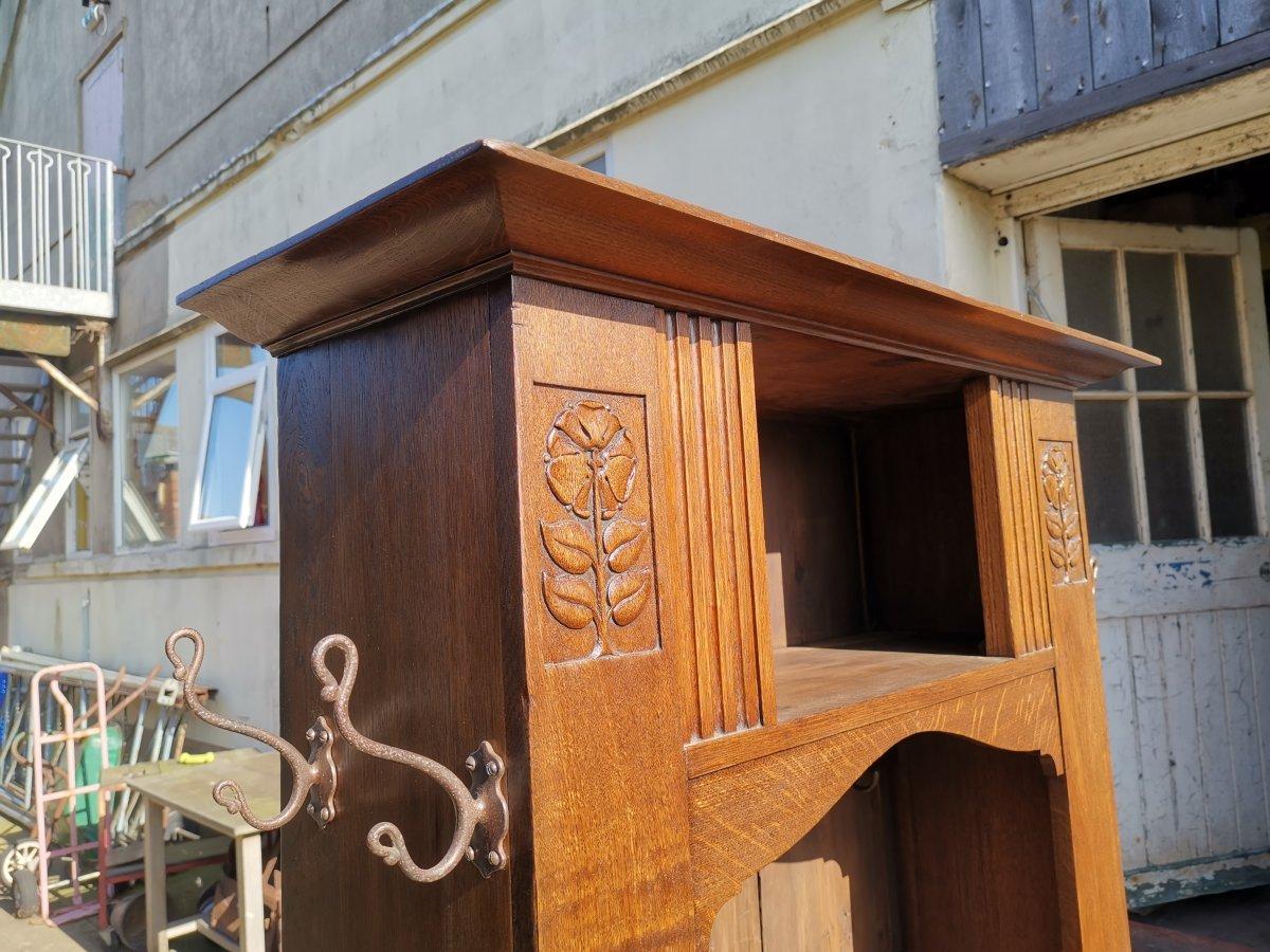 English Shapland & Petter, Style of MH Baillie Scott, an Arts & Crafts Oak Hall Cupboard For Sale