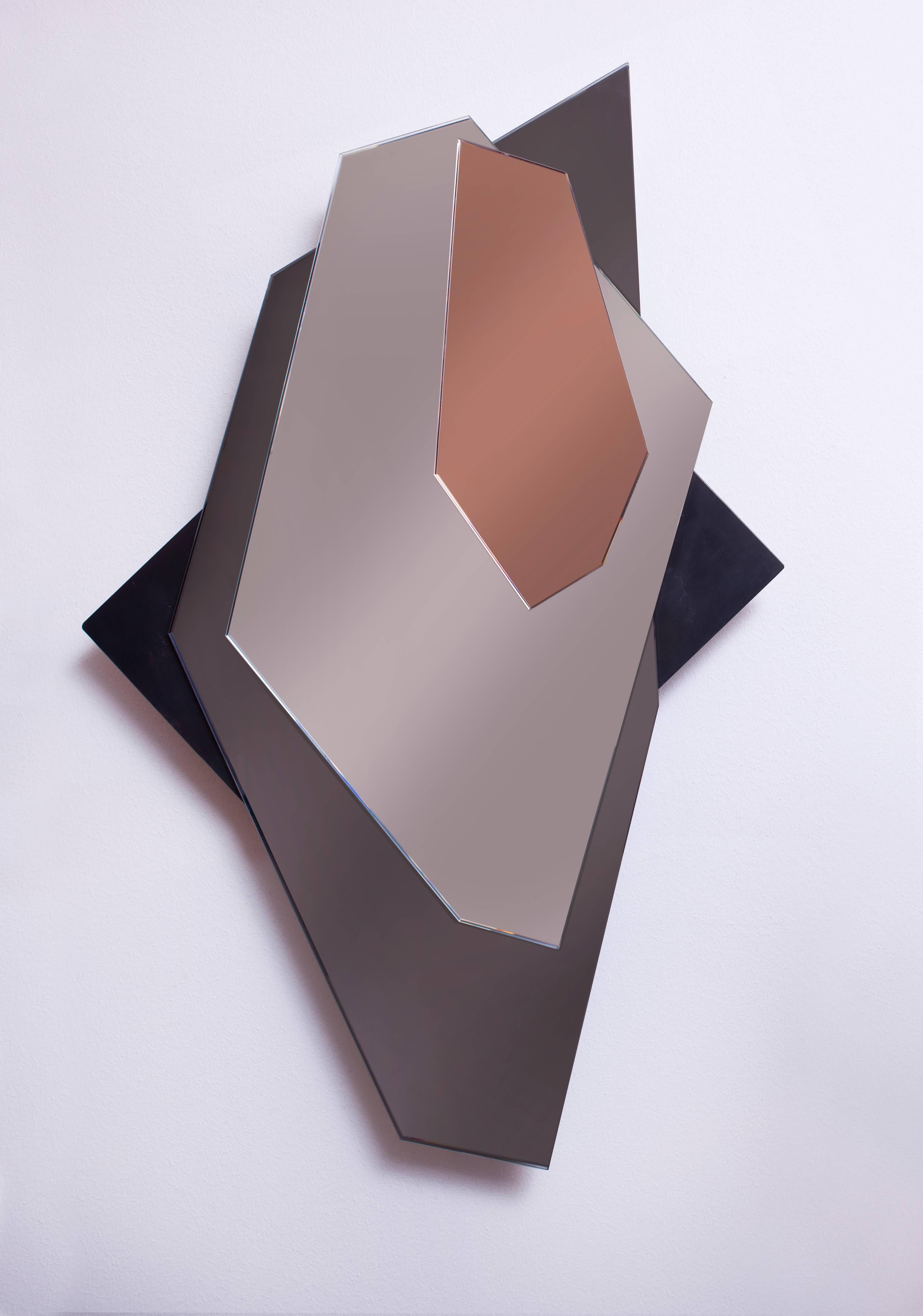 High end mirror by Harry Clark in three different glass mirror colors on a metallic powder-coated base.
The quality of the glass work is outstanding.

