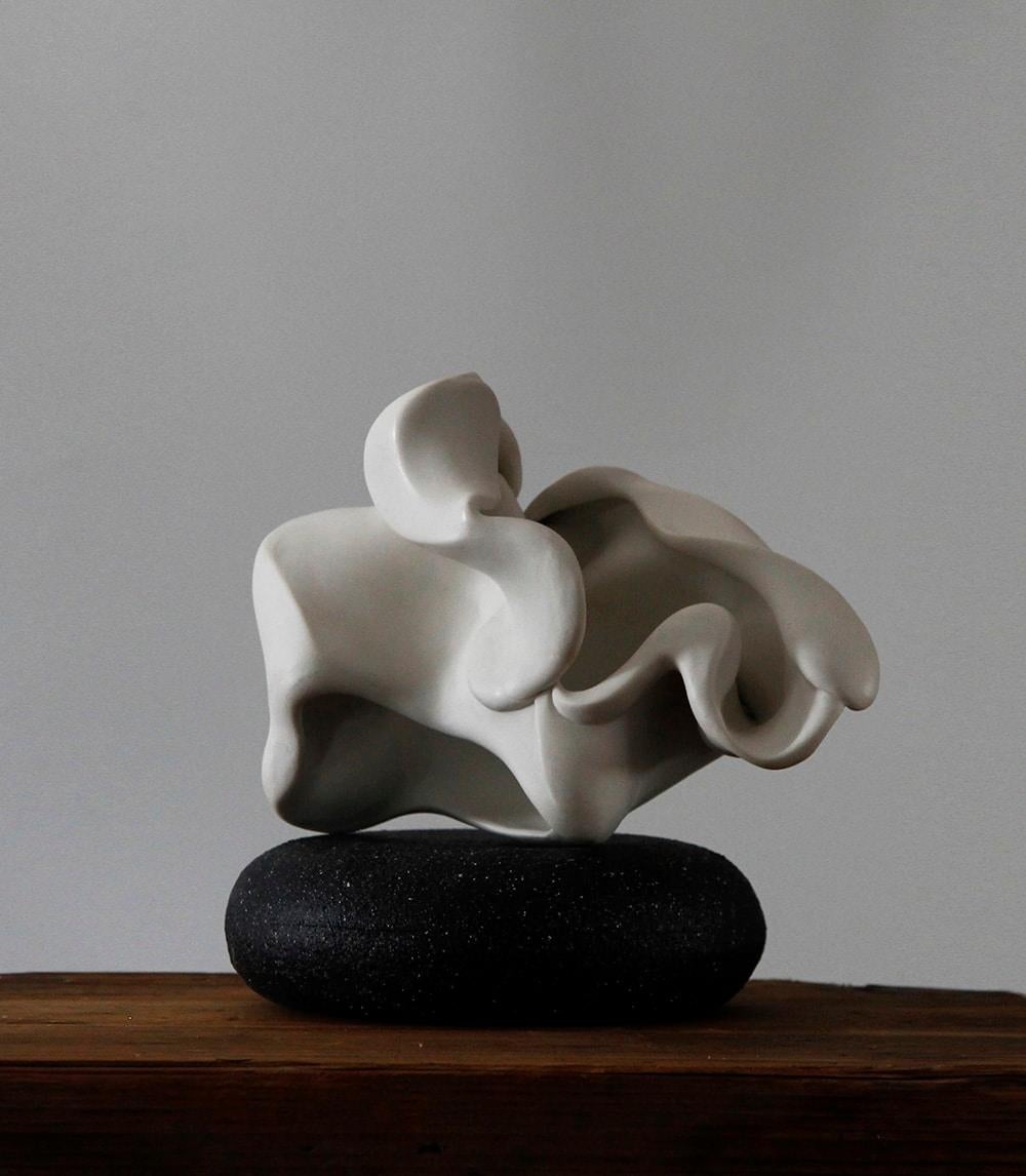 Conch 31 is a unique sculpture by contemporary artist Sharon Brill. This is a wheel thrown altered and sandblasted porcelain sculpture, sold with a stand made of painted clay, dimensions are 9.5 × 19 × 15 cm (3.7 × 7.5 × 5.9 in).

Sharon Brill’s