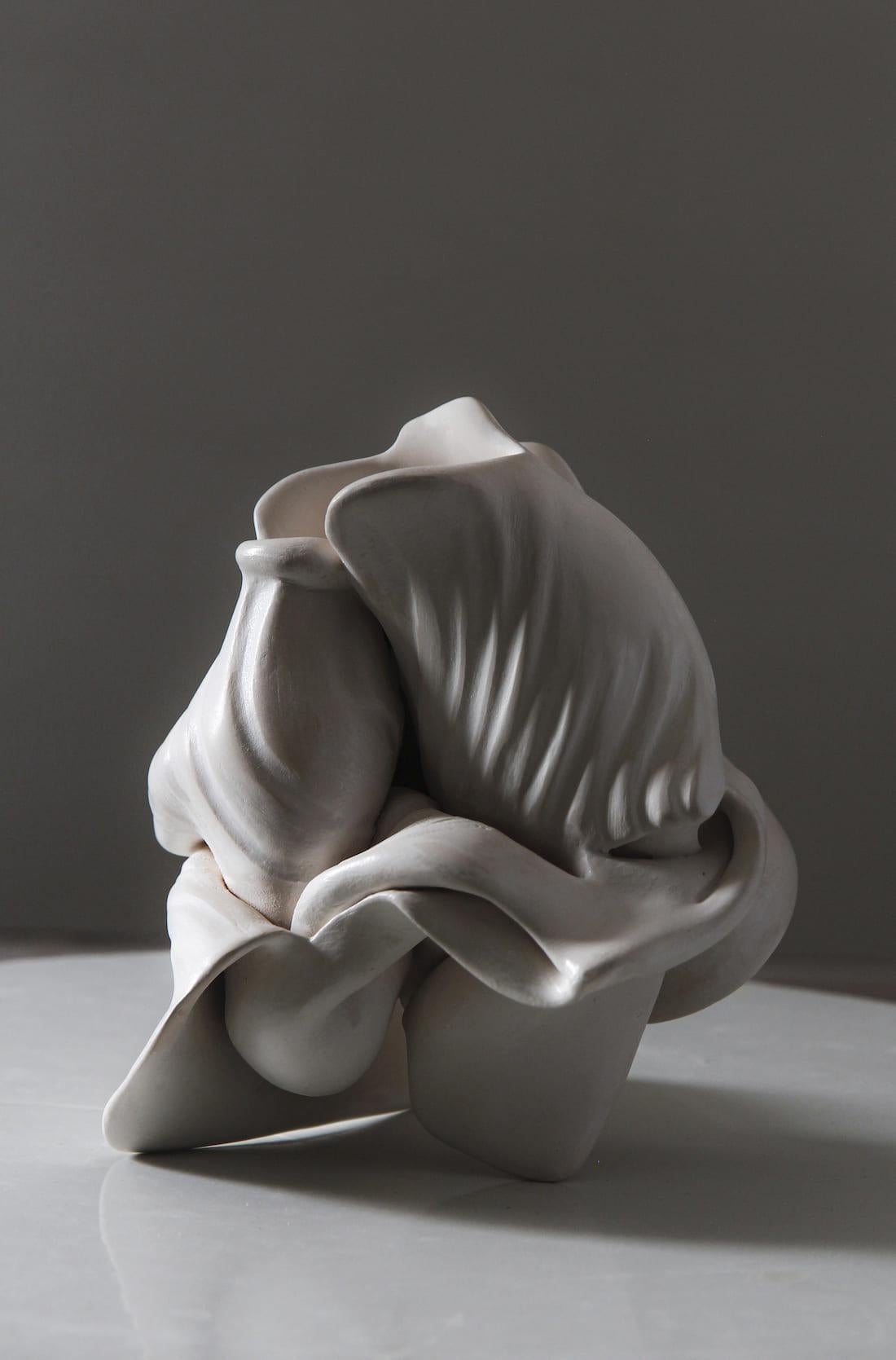 Conch 4, porcelain sculpture by Sharon Brill. 
Wheel thrown and sandblasted porcelain, 14 cm × 14 cm × 13 cm. Sold with a stand made of painted clay.
Israeli ceramic artist Sharon Brill chose to work mainly on porcelain, with which she creates