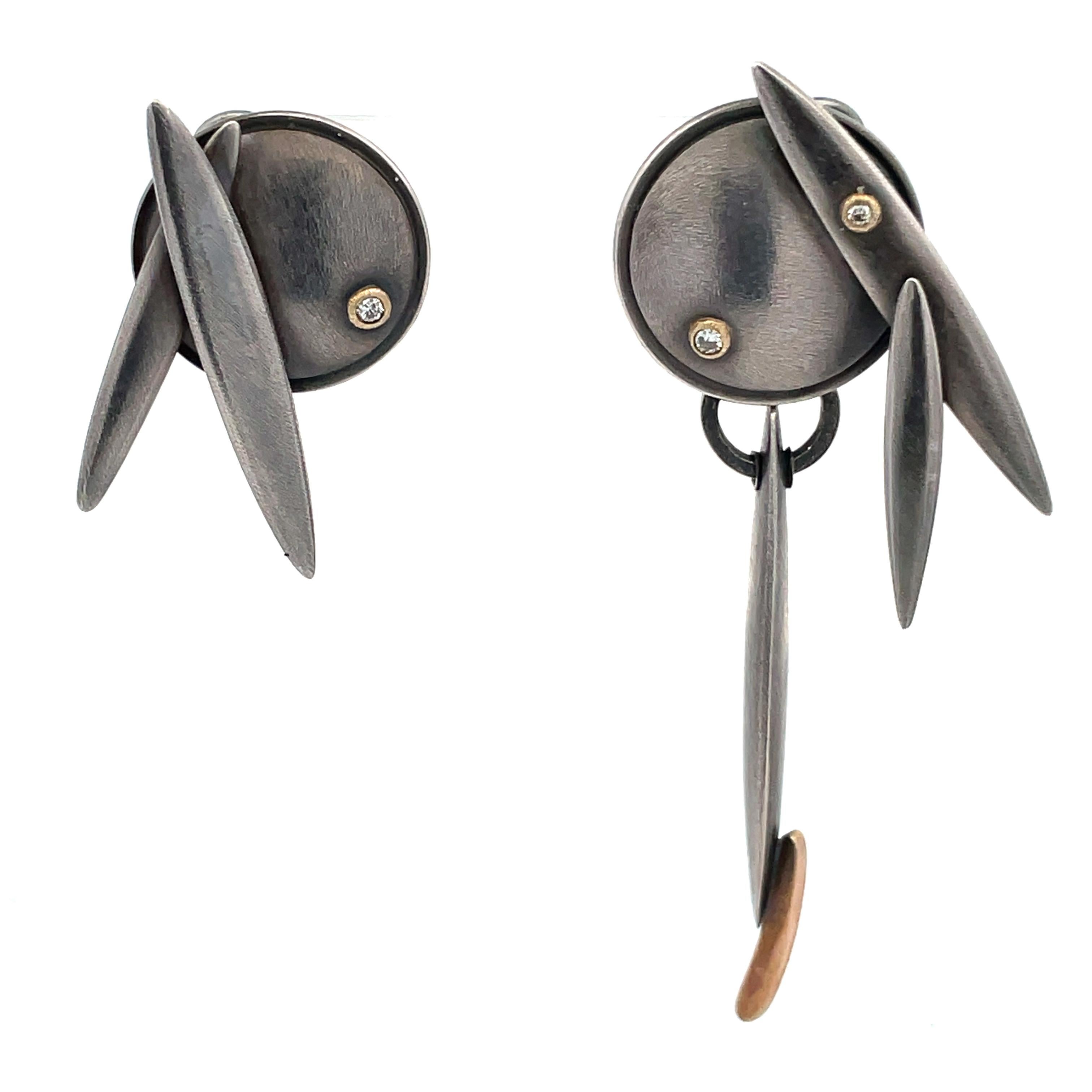 From a private estate, a rare find, asymmetrical oxidized sterling, 14K gold and diamond earrings, circa late 1980's, by peerless metalsmith, designer and educator Sharon Church (1948-2022).  The earrings measure 1