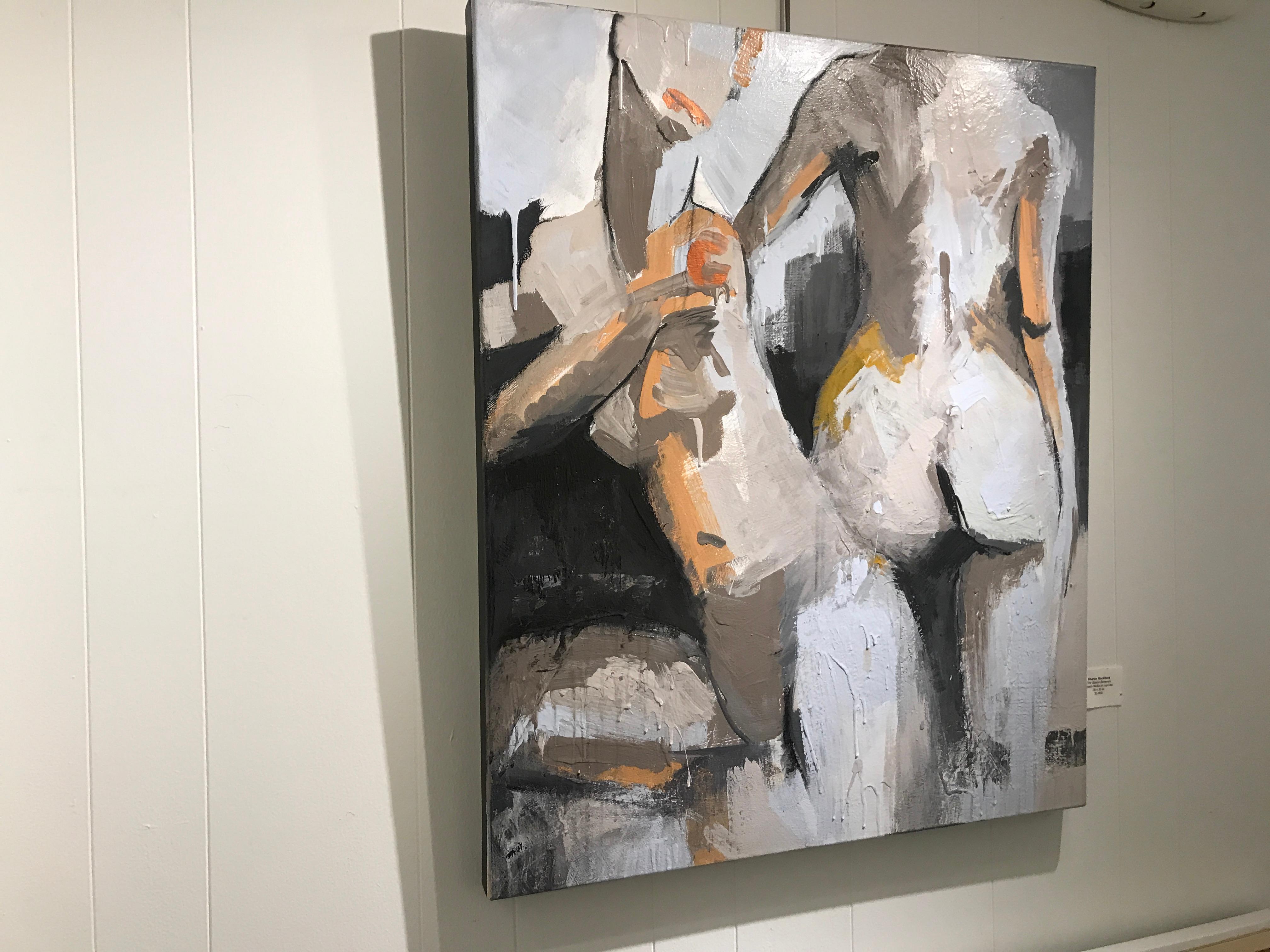 'The Space Between' is a medium size mixed media on canvas nude painting created by American artist Sharon Hockfield in 2019. Featuring a muted palette made of brown, grey and orange tones, this unframed contemporary painting depicts two female