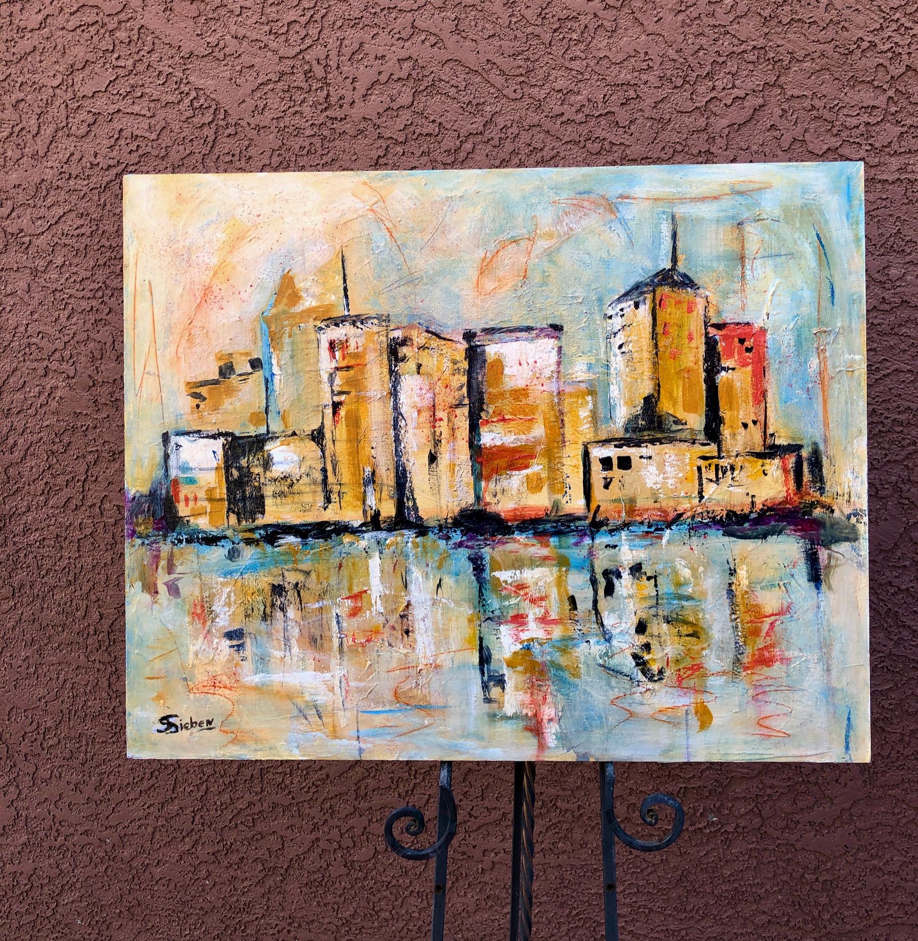 <p>Artist Comments<br>Sharon Sieben pictures an abstracted glimpse of a stunning skyline. Buildings reach out into the sky and reflect on the gleaming riverfront. She adds energetic marks with wavy lines of red and blue. In bold strokes, she aptly