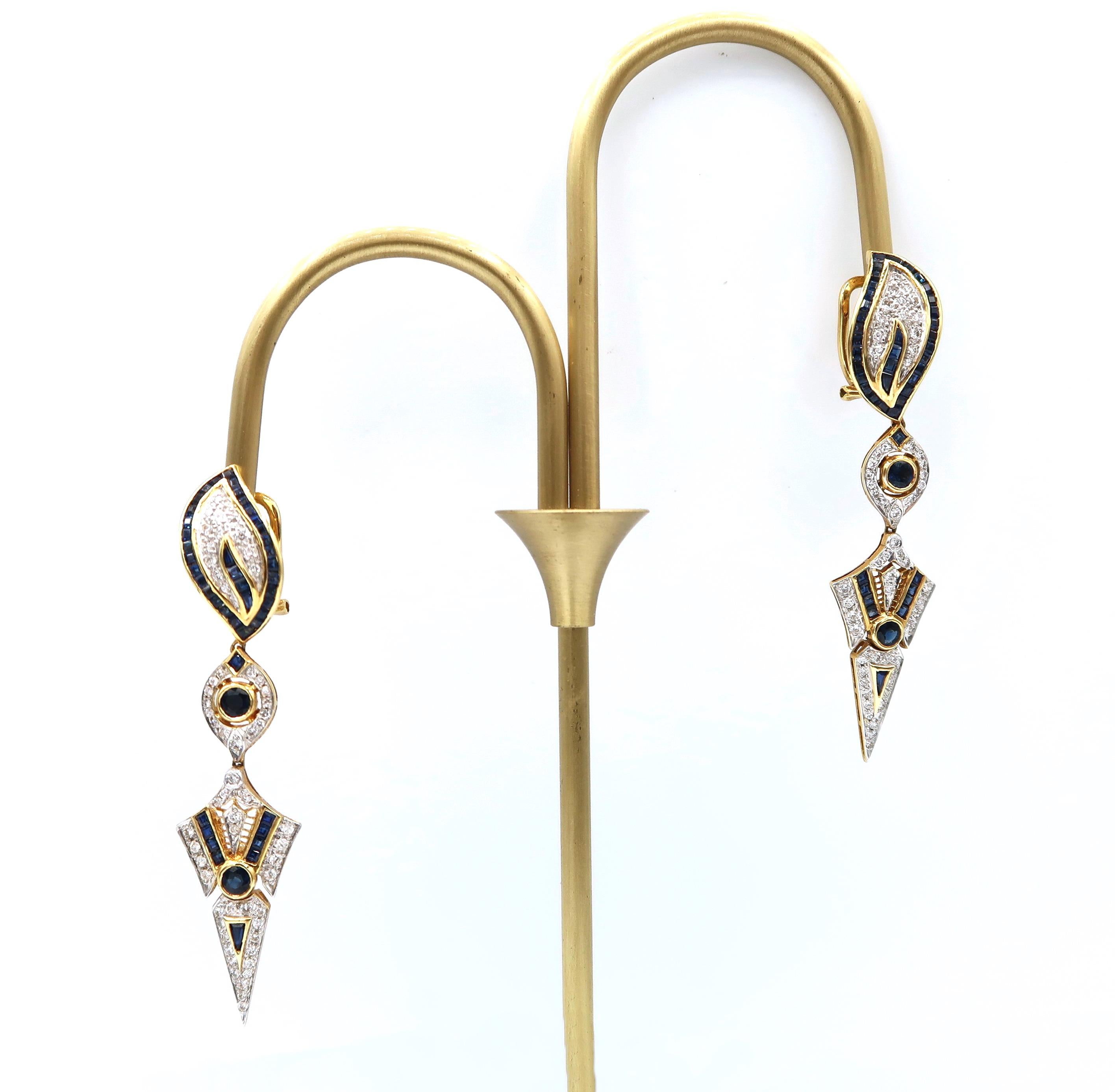 Sharp-Pointed Sapphire and Diamond Long Drop Earrings in 18K Yellow Gold Earrings with omega backs

Sapphire: 6.57 ct
Diamond: 1.92 ct
Gold: 18K Gold, 16.48 g

Length: 68 mm