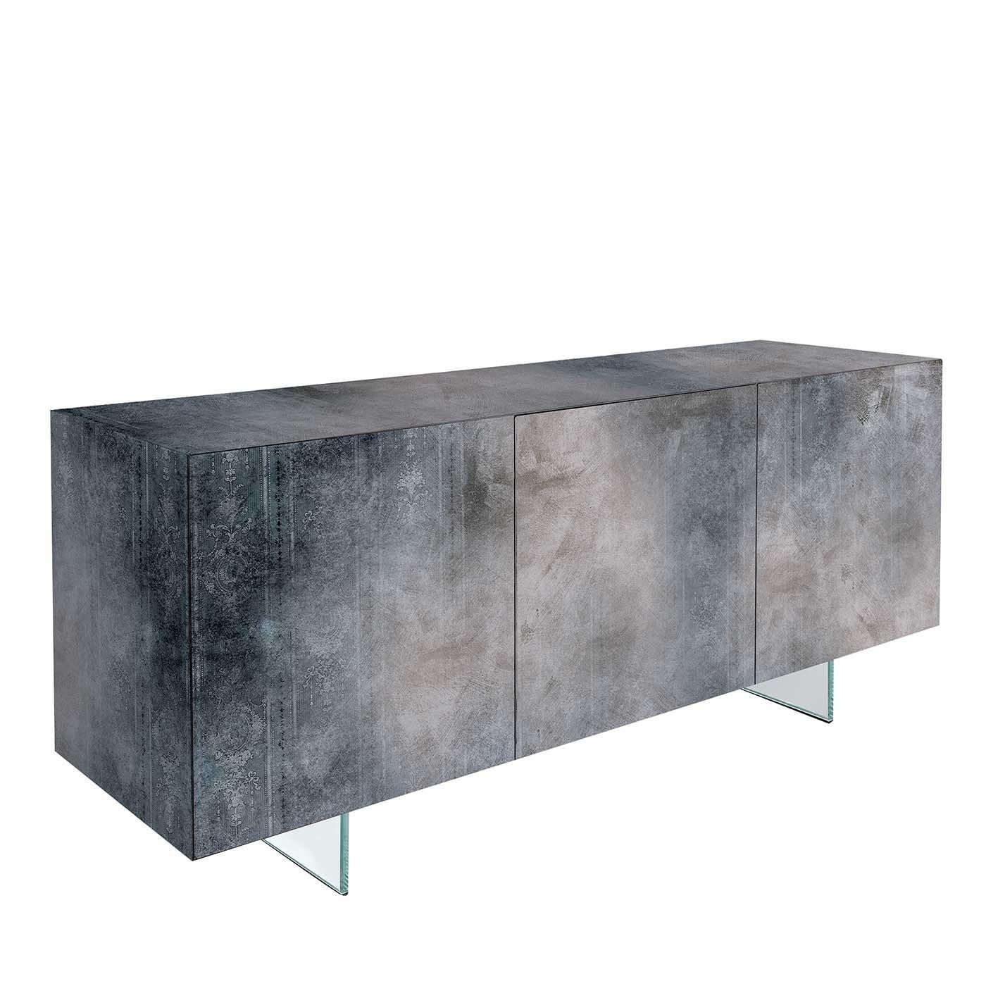 Modern and sophisticated, this three-door sideboard is entirely crafted using MDF panels with a lacquered finish. The sides and front doors are connected with 45° angles. The entire piece is covered with a material surface that is applied by hand,