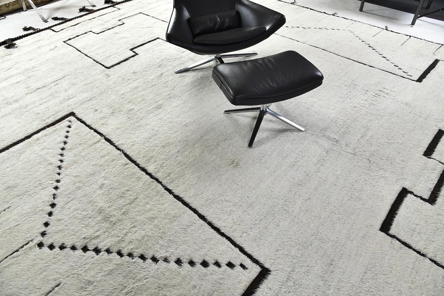 Sharqi’ features cozy colour palette and wonderfully soft pile. Waves of abrash between tranquil shades of ivory and brown statements give dimension and added visual interest to the understated yet impactful. This versatile transitional rug would