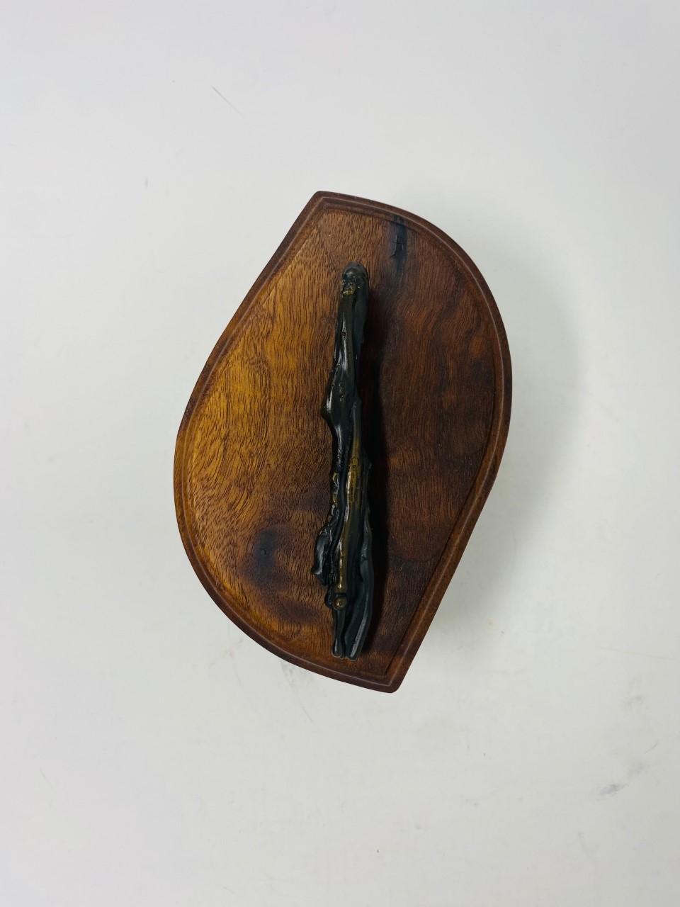 Incredible piece sculpture by artists Chris (American, 20th century) & Pat Shatsby (American, 1935-2010). A Brutalist style box comprised of rosewood and bronze having an elongated abstract bronze handle. Signed to the underside of box 
