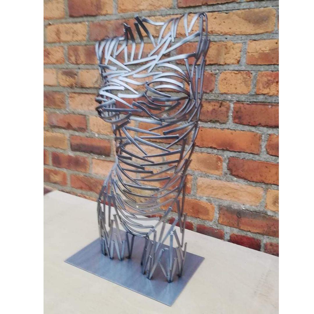 Nailed It Front - original metallic female form sculpture - contemporary art  - Sculpture by Shaun Gagg