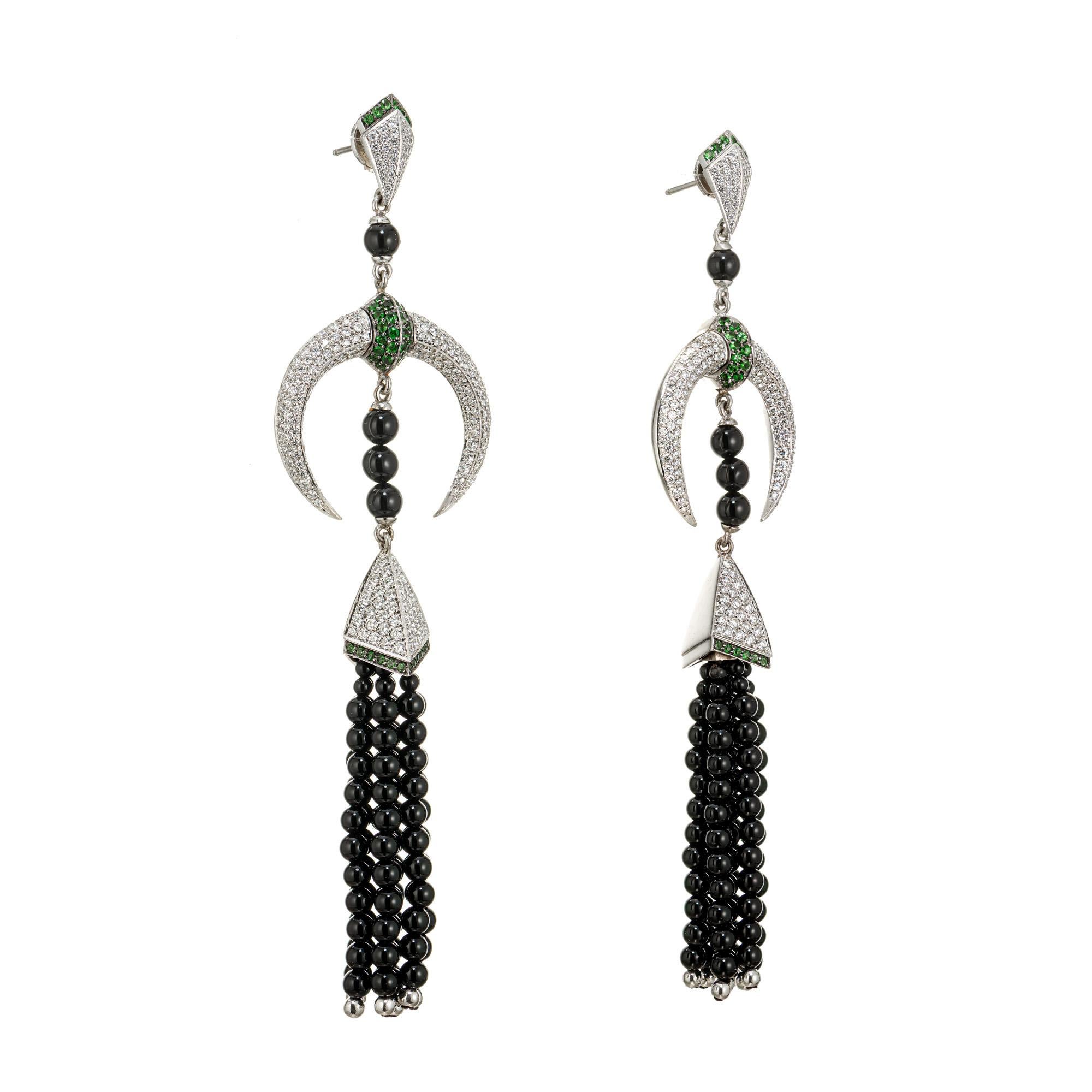 Shaun Leane Onyx Tassel, diamond and tsavorite 18 karat white gold dangle chandelier earrings. inspired by the Art Deco period Shaun Leane Tribal Deco is his own blended style. 

Approx. 108 round green Tsavorite, approx. total weight .76cts
Approx.